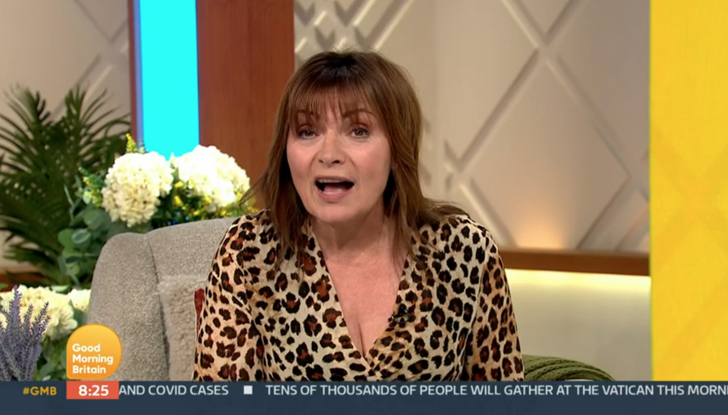 Lorraine Kelly wearing a leopard-print dress