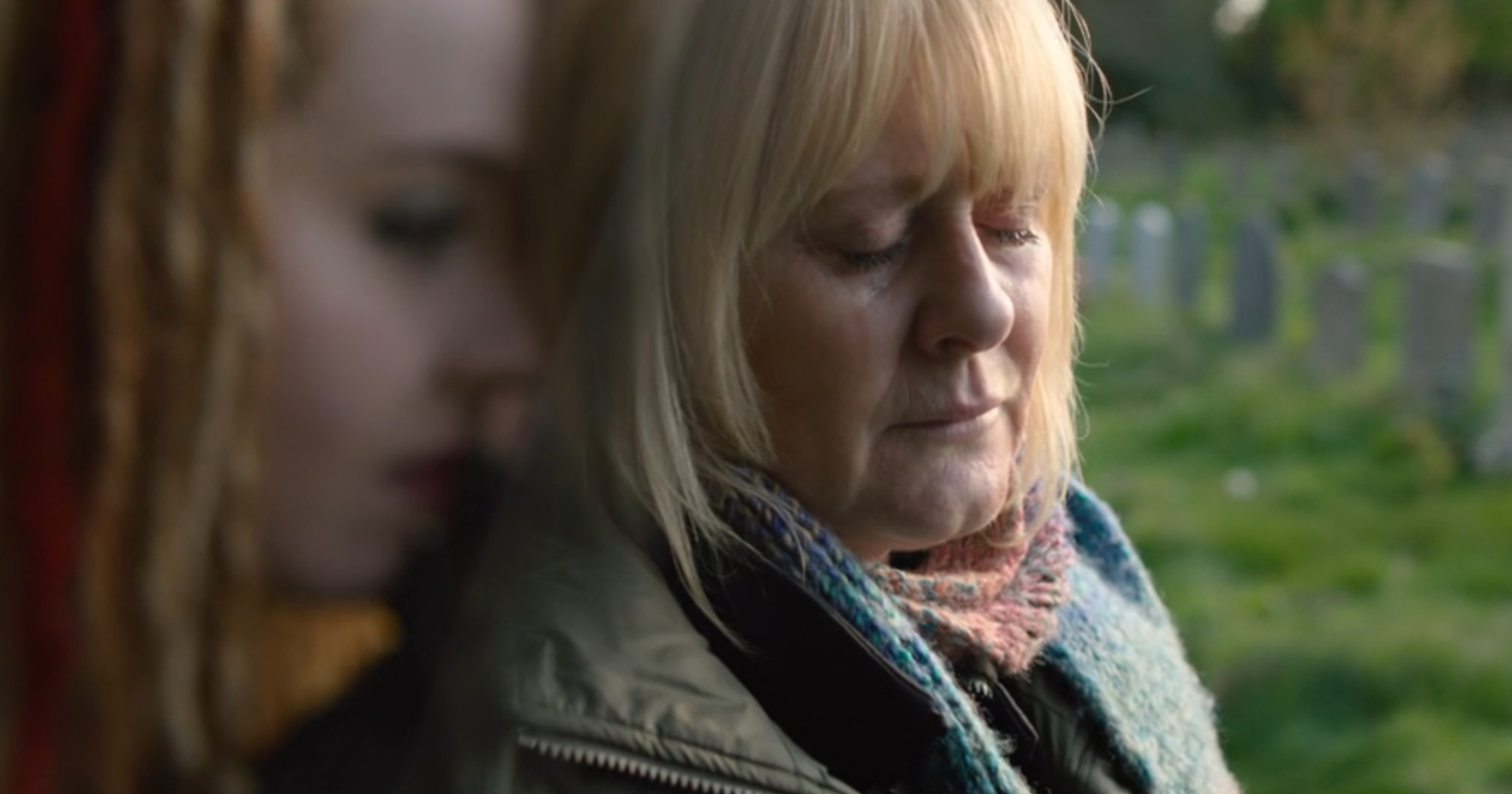 Becky and Catherine hug in the grave in Happy Valley