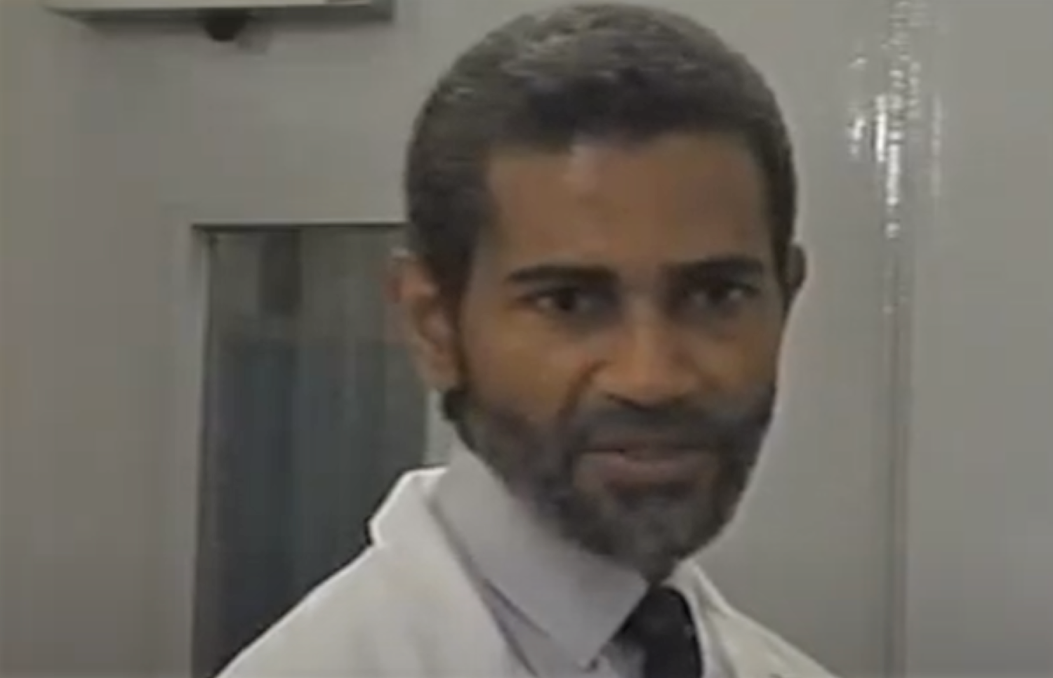 Wyllie Longmore as Dr McKinnon looking worried in Coronation Street