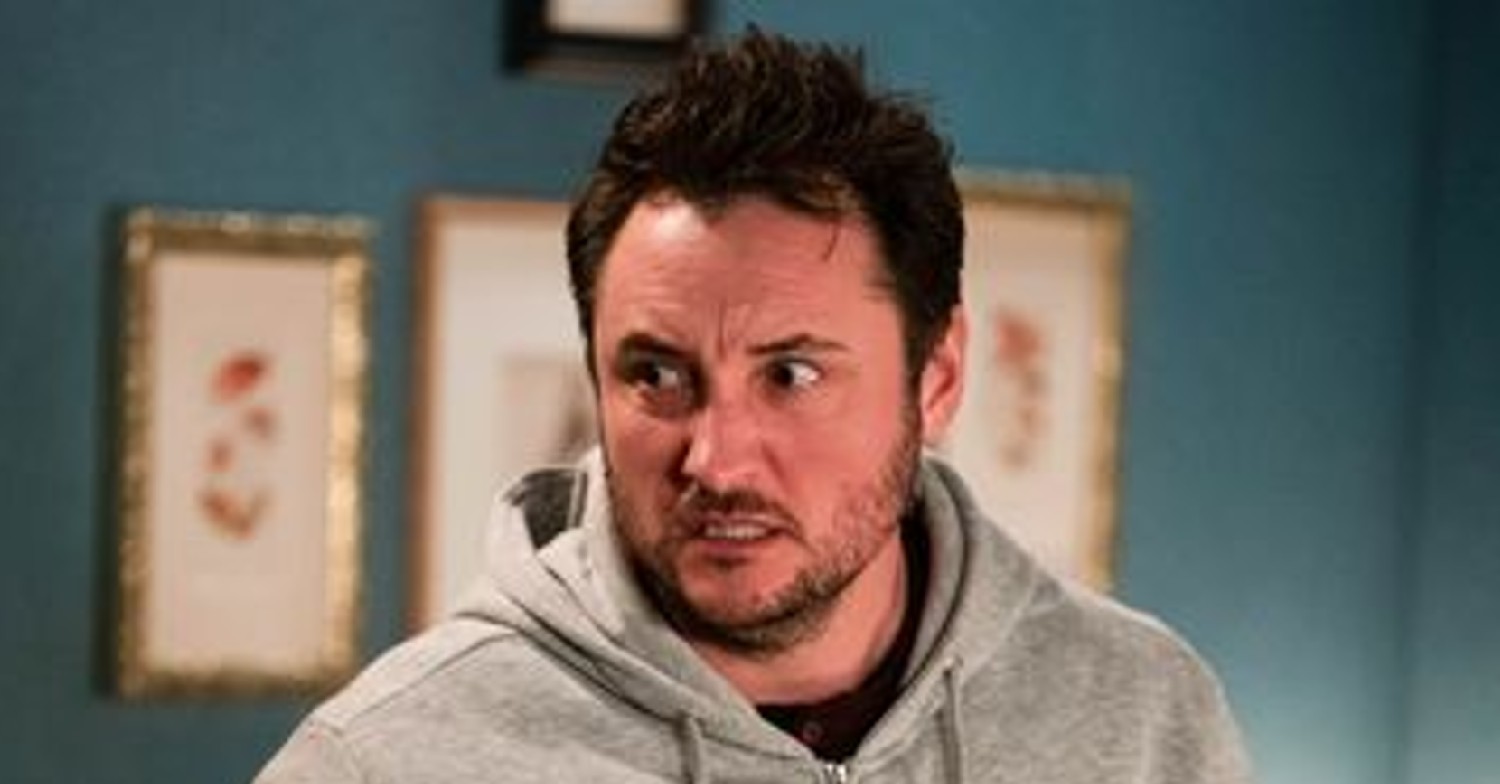 Martin Fowler looks scared in EastEnders