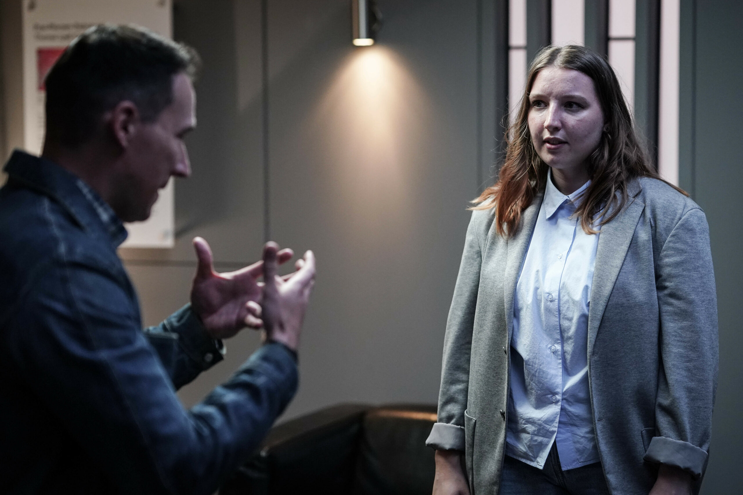 Rhiannon May wears grey suit as Cara Connelly in Silent Witness