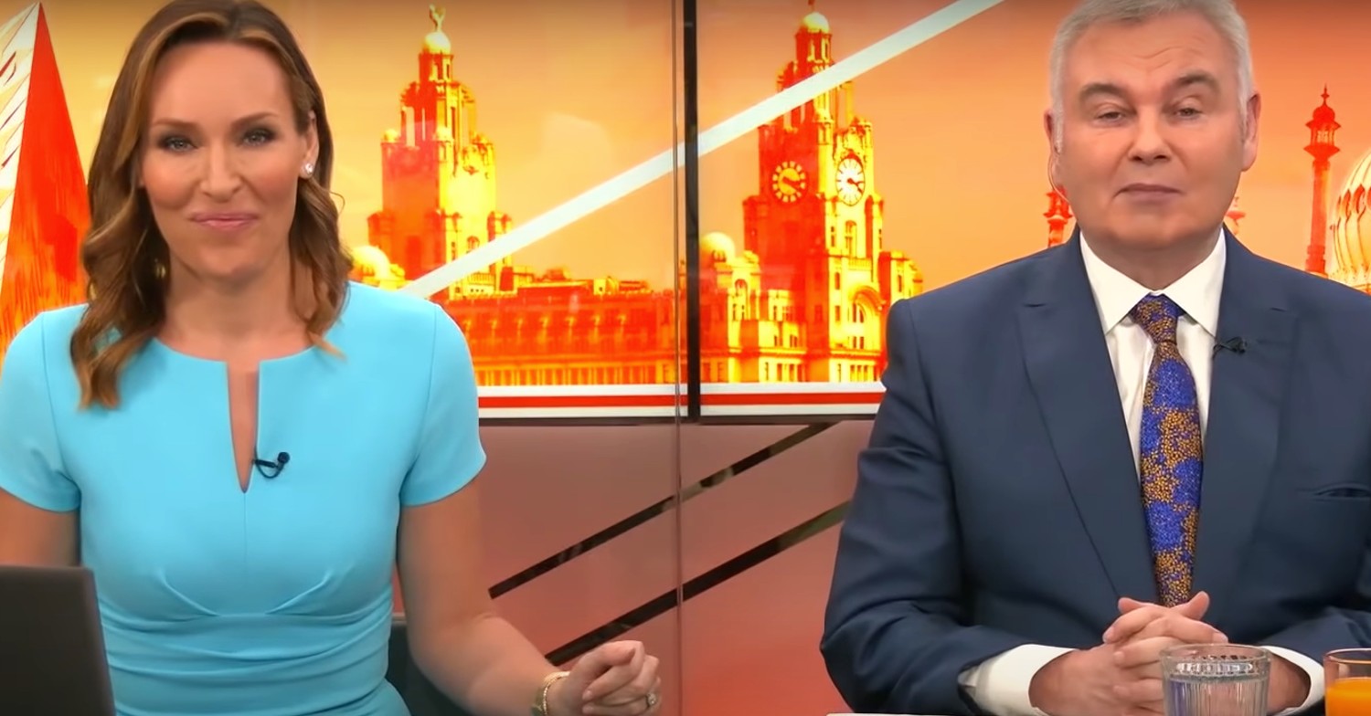 Eamonn Holmes and Isobel Webster smiling on GB News