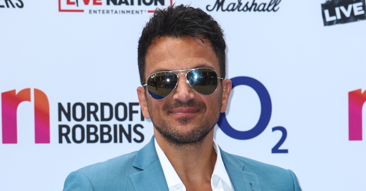 Peter Andre posing on red carpet 