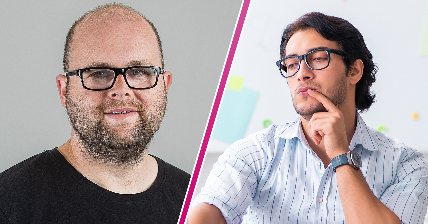 Two men in glasses – one smiling and one concentrating