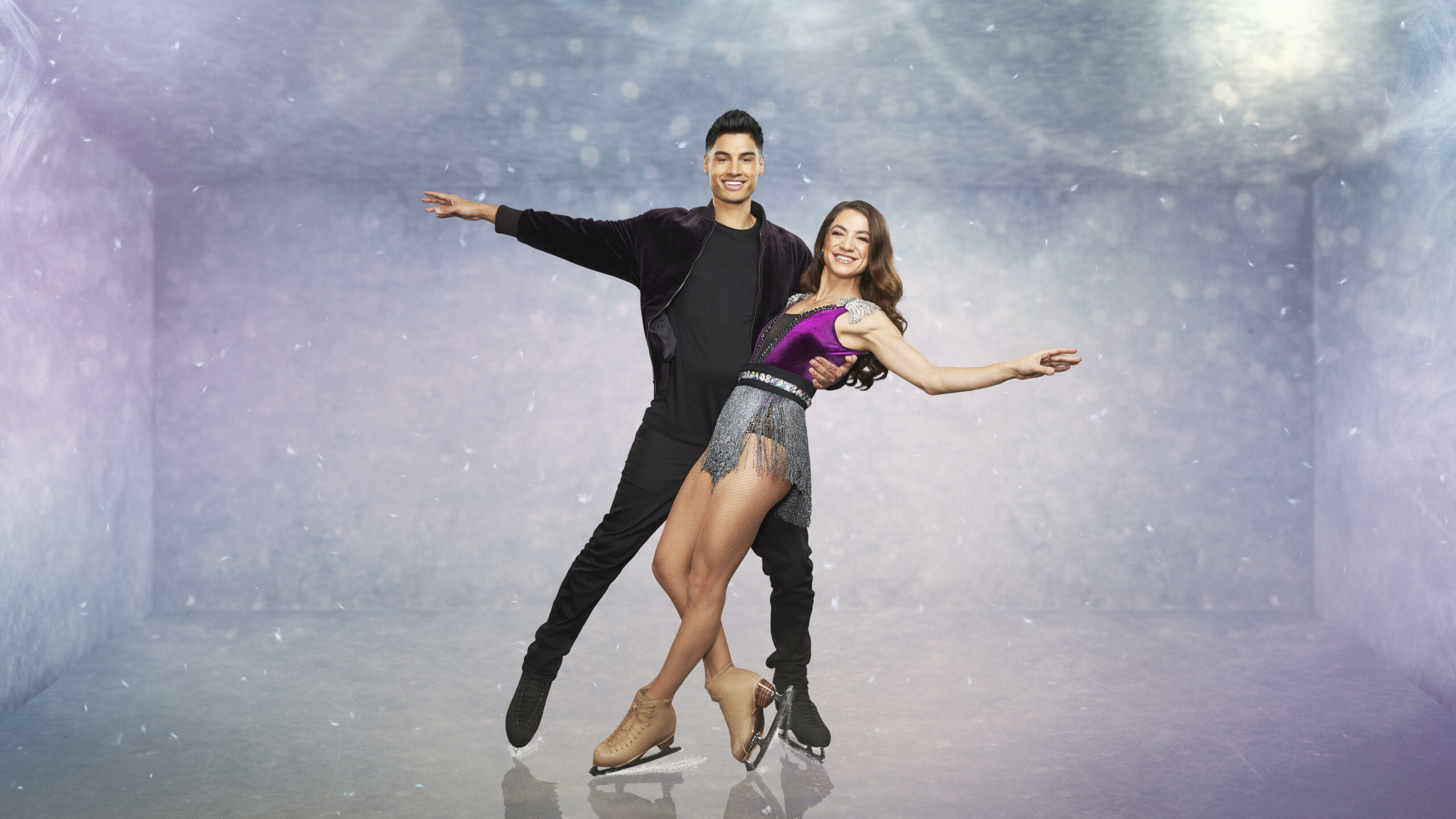 Siva and Klabera pose on the ice