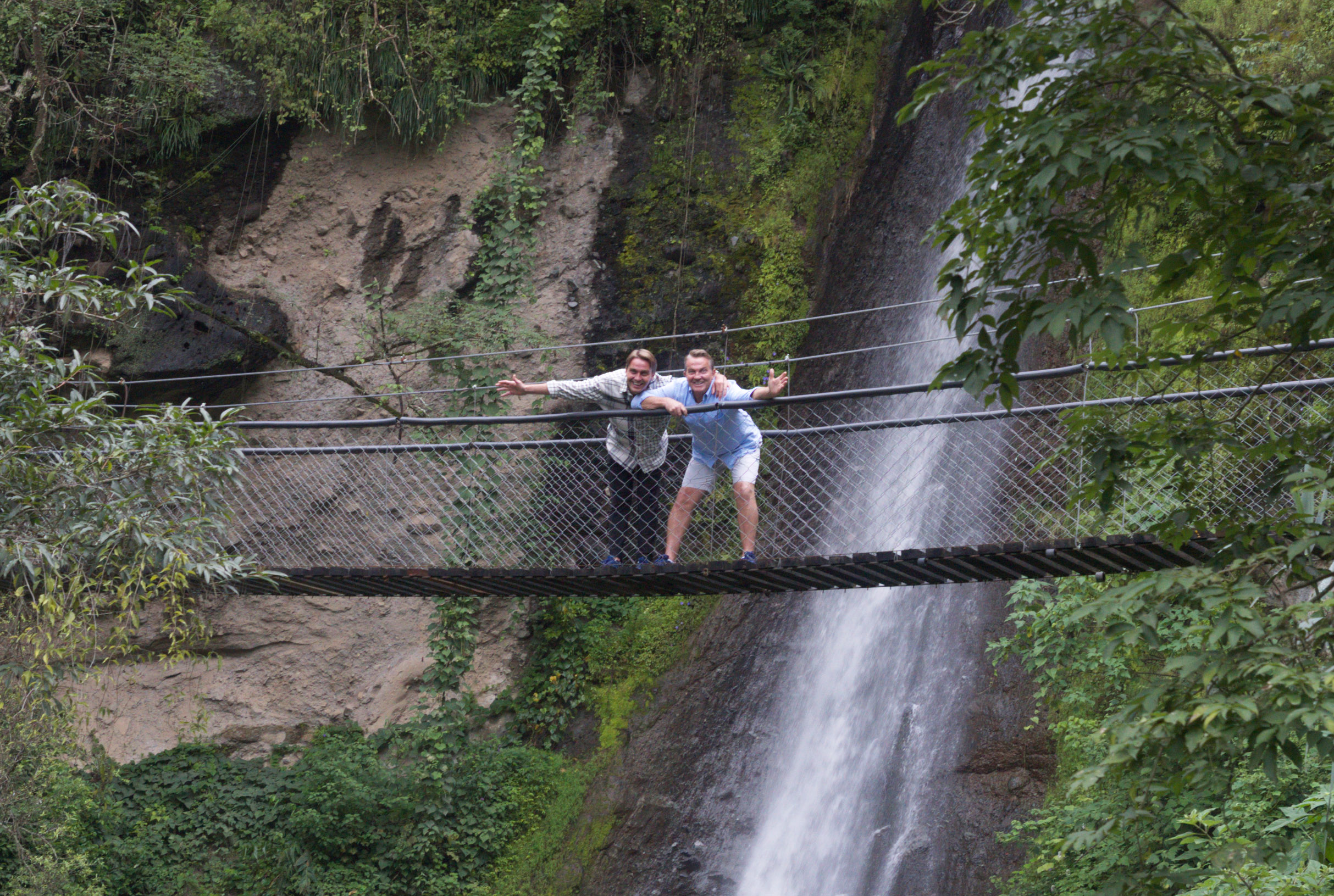 Bradley and Barney smile on a bridge in Breaking Dad