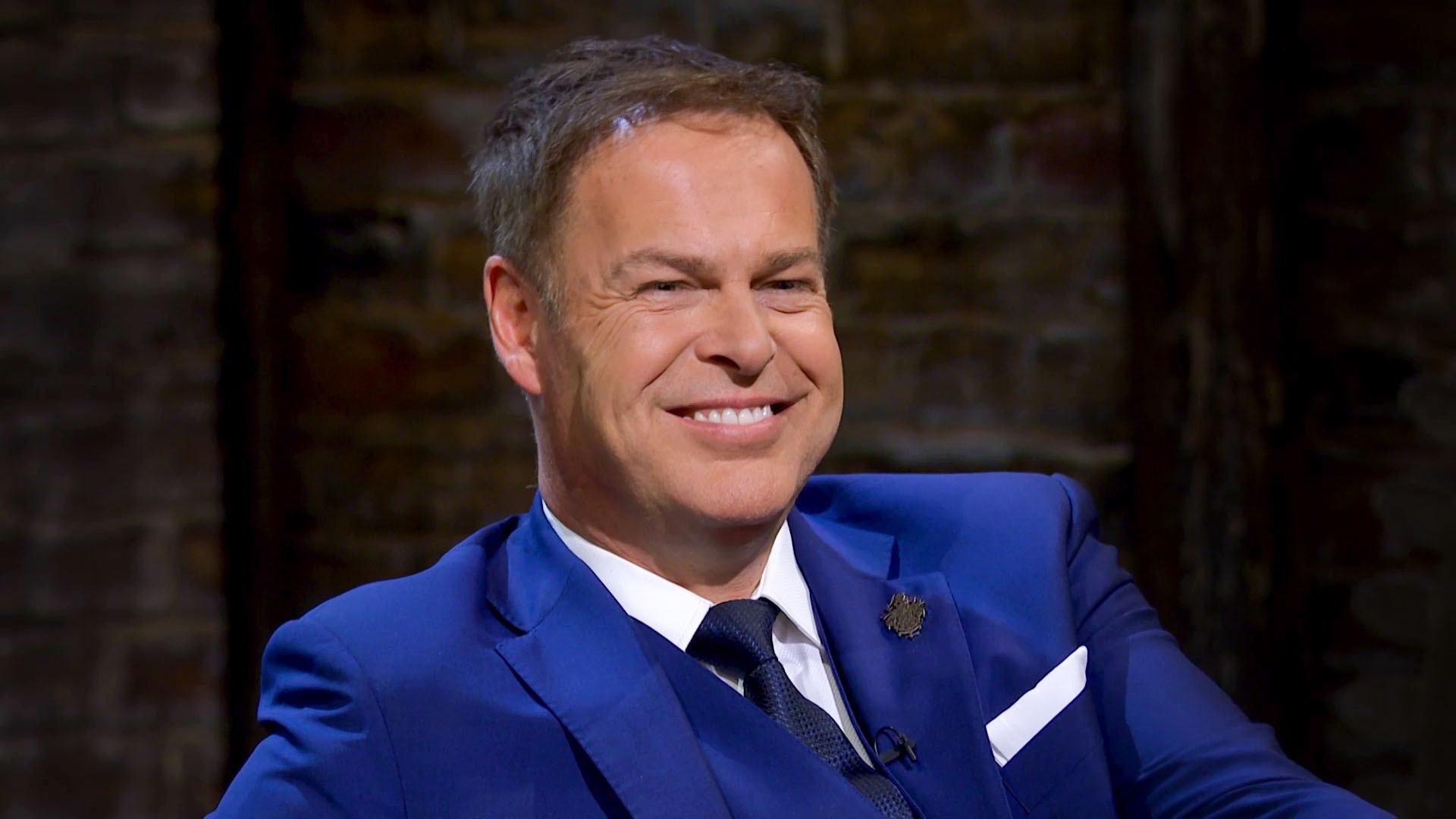 Peter Jones smiling on Dragons' Den