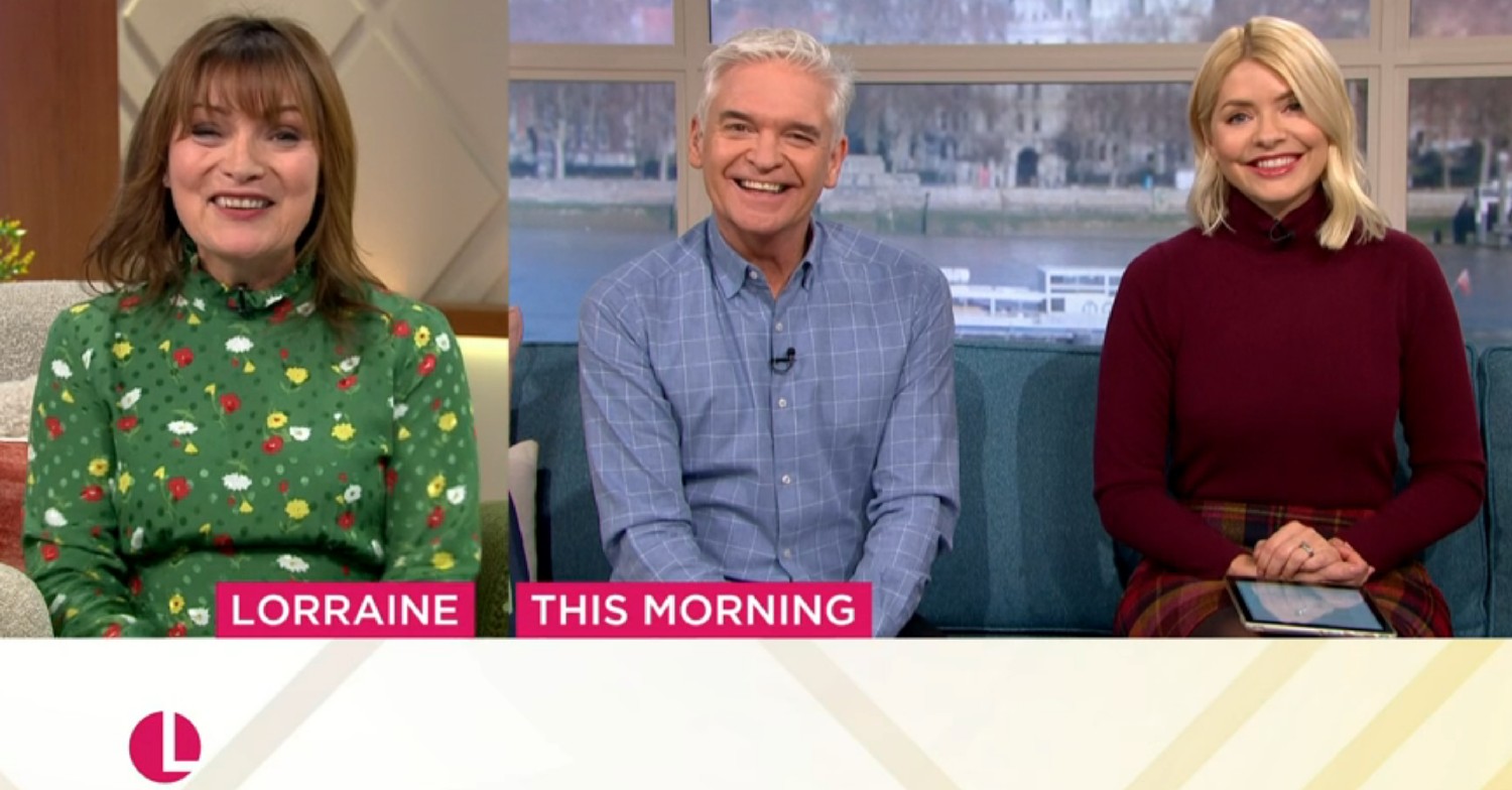 Lorraine smiling as she speaks to Phillip Schofield and Holly Willoughby on video link