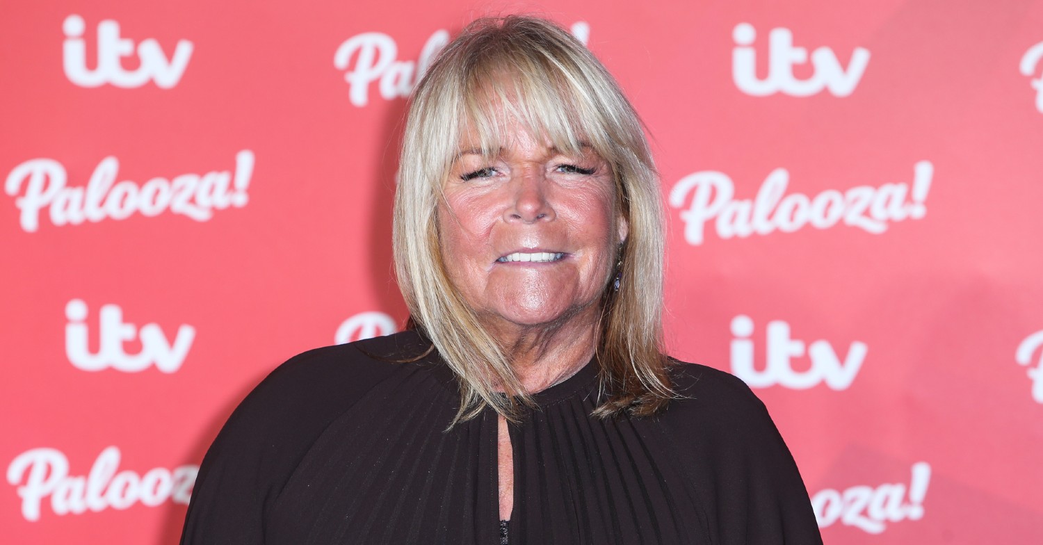 Loose Women star Linda Robson posing in a black dress
