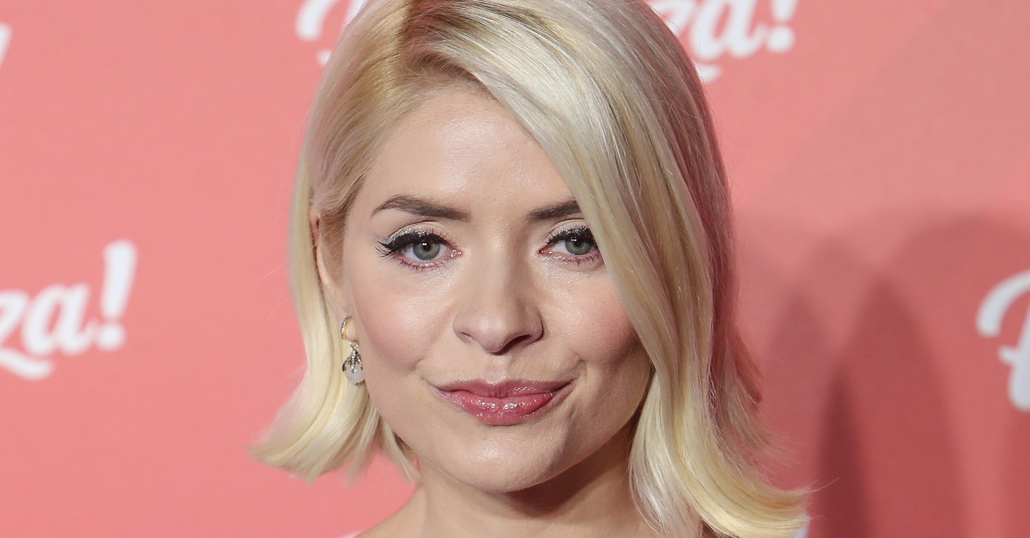 Holly Willoughby smiling on the red carpet