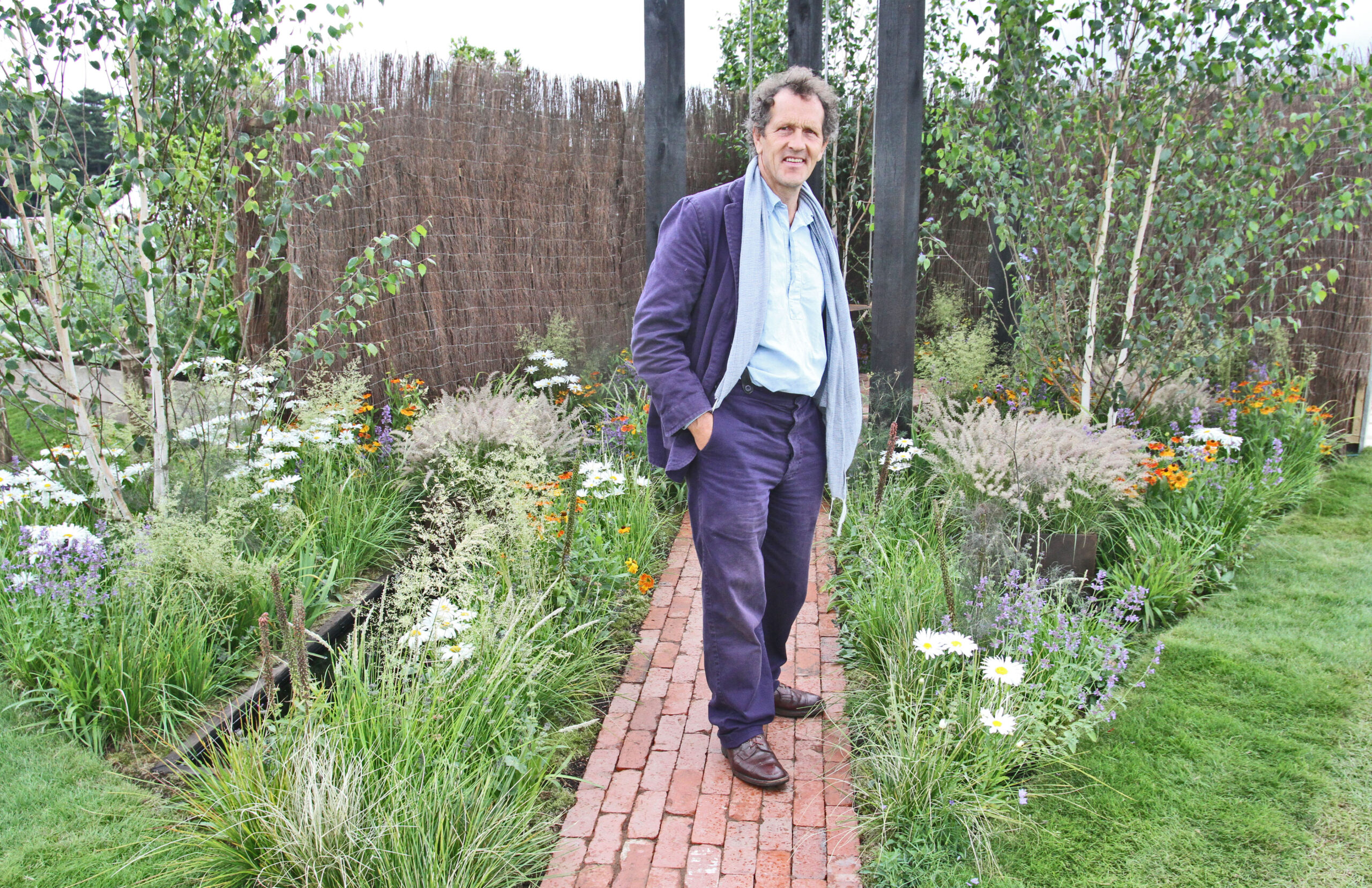 Monty Don wearing a purple suit