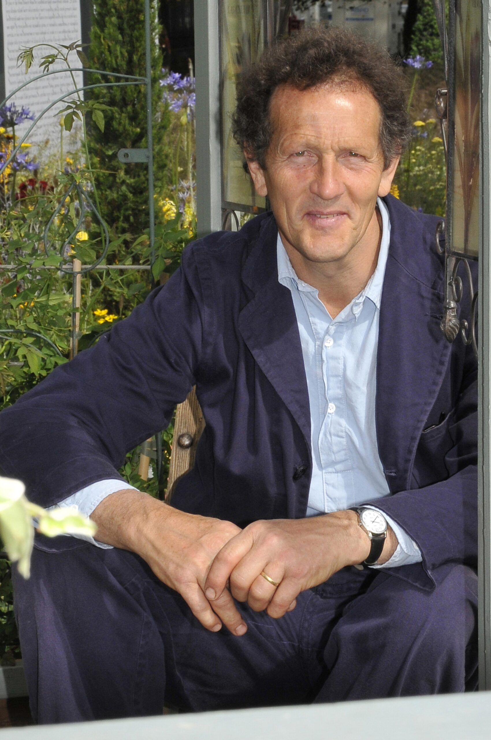 Monty Don wearing a purple suit