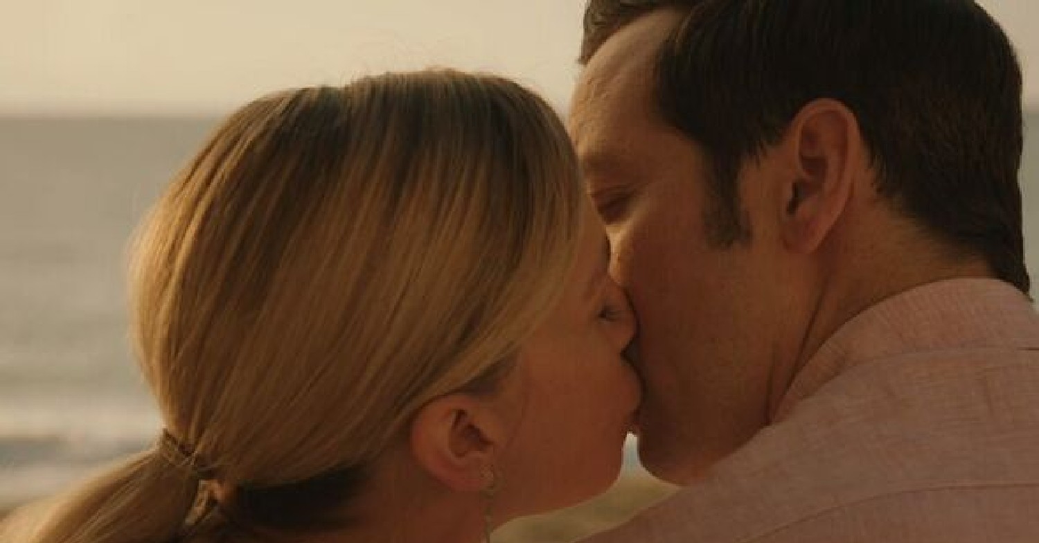 Sophie and Neville kissing in Death in Paradise