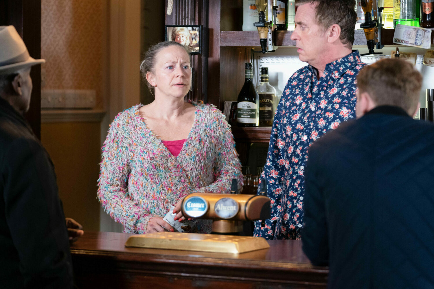 Worried looking Linda offers to help Jay and Alfie looks concerned in EastEnders