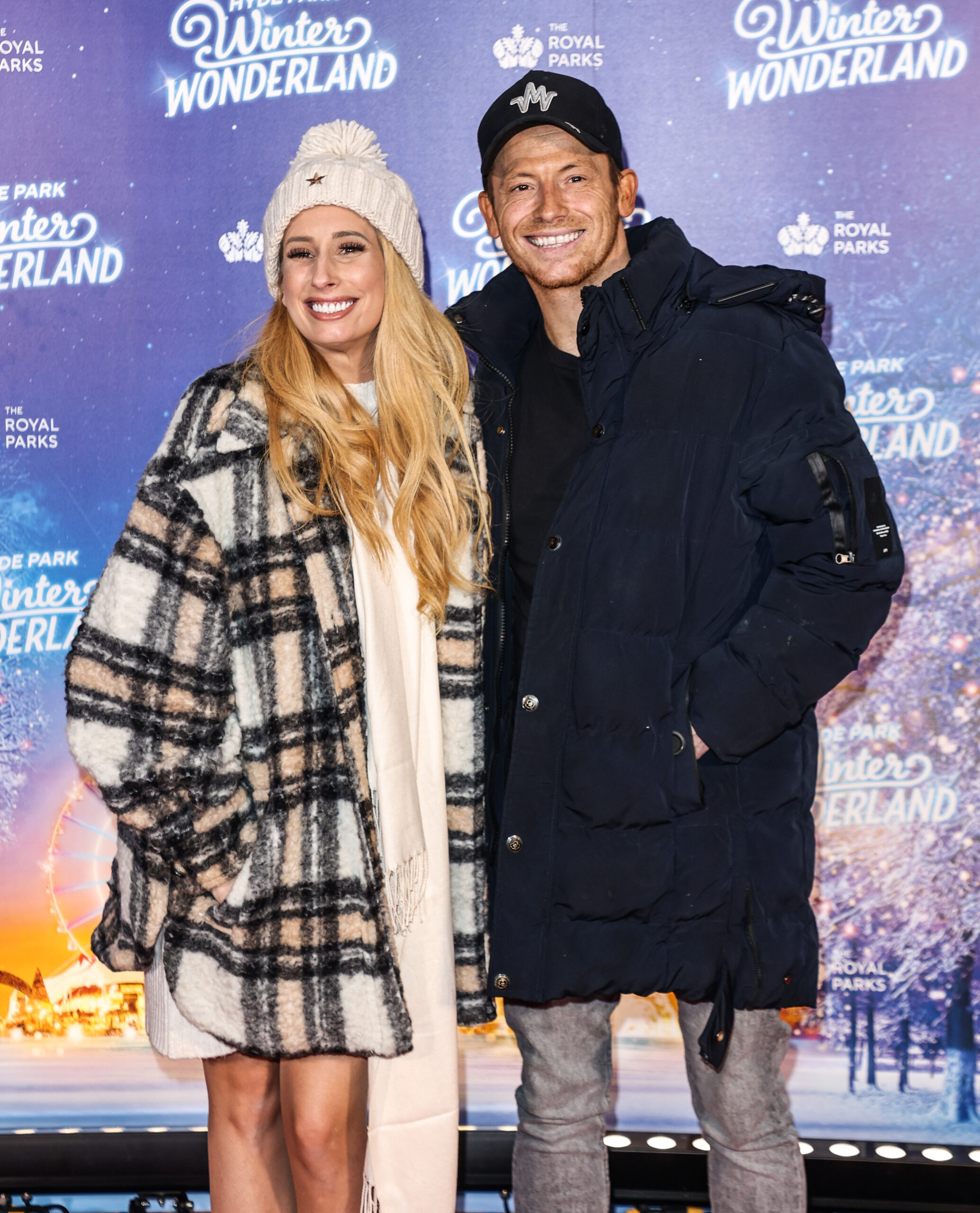 Stacey Solomon and her husband Joe Swash smiling