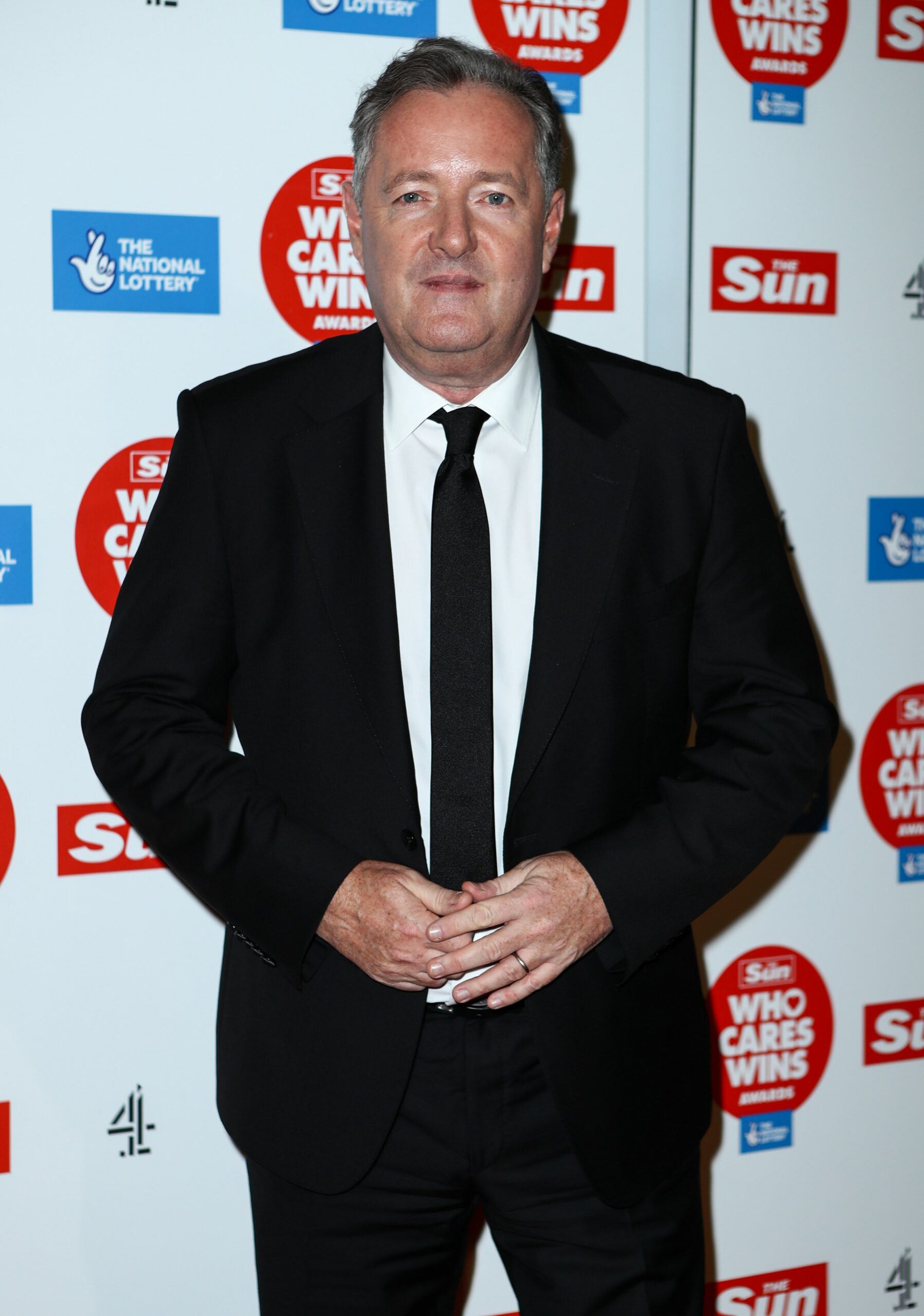 Piers Morgan smiles at Who Cares Wins Awards