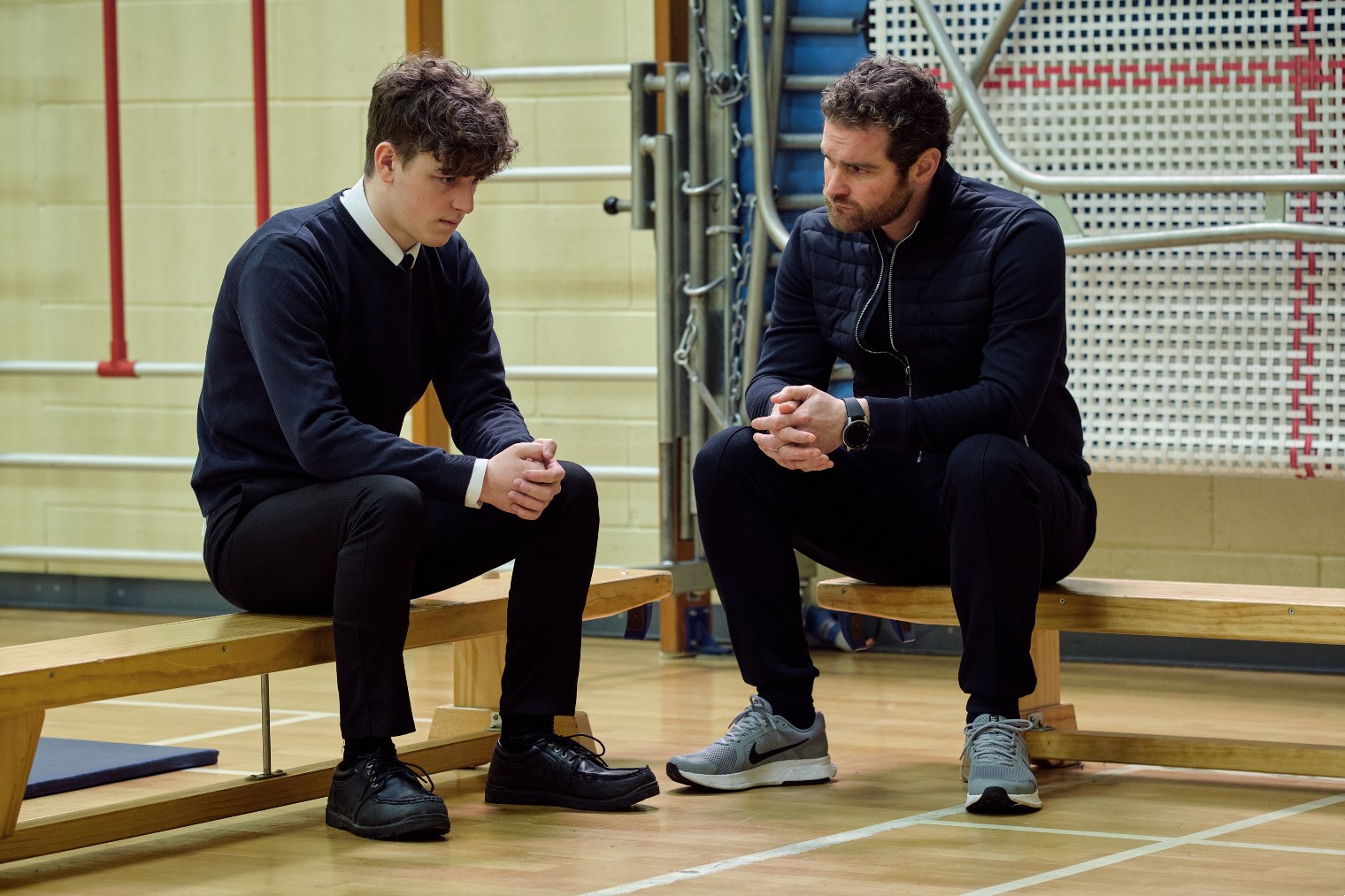Ryan and Rob Hepworth talk in school in Happy Valley