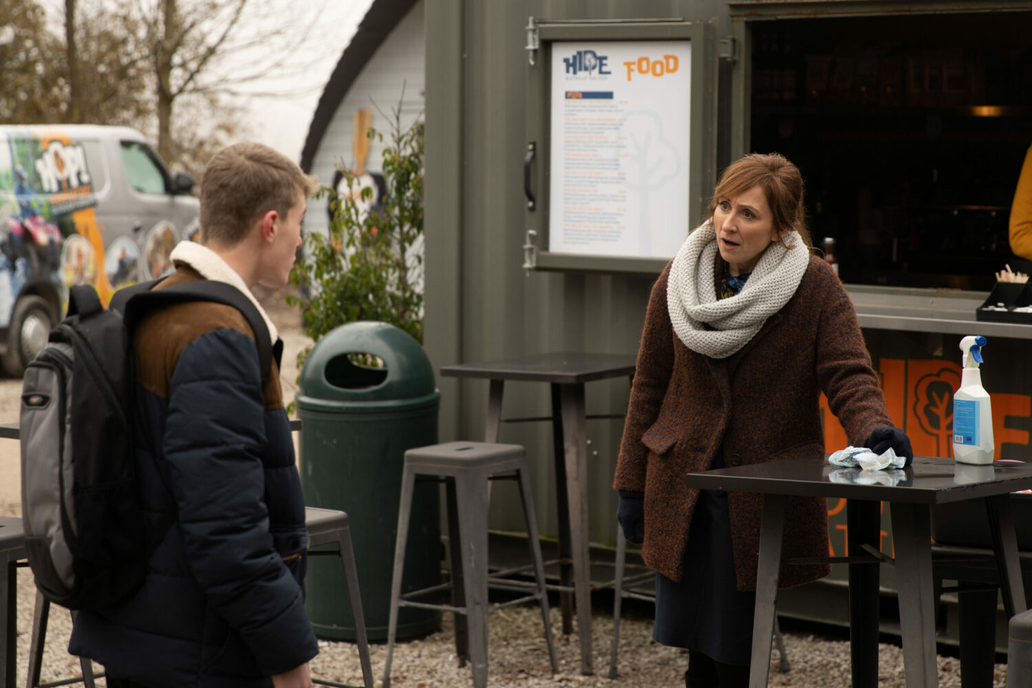 Emmerdale's Laurel is looking at Arthur with concern outside of The Hide