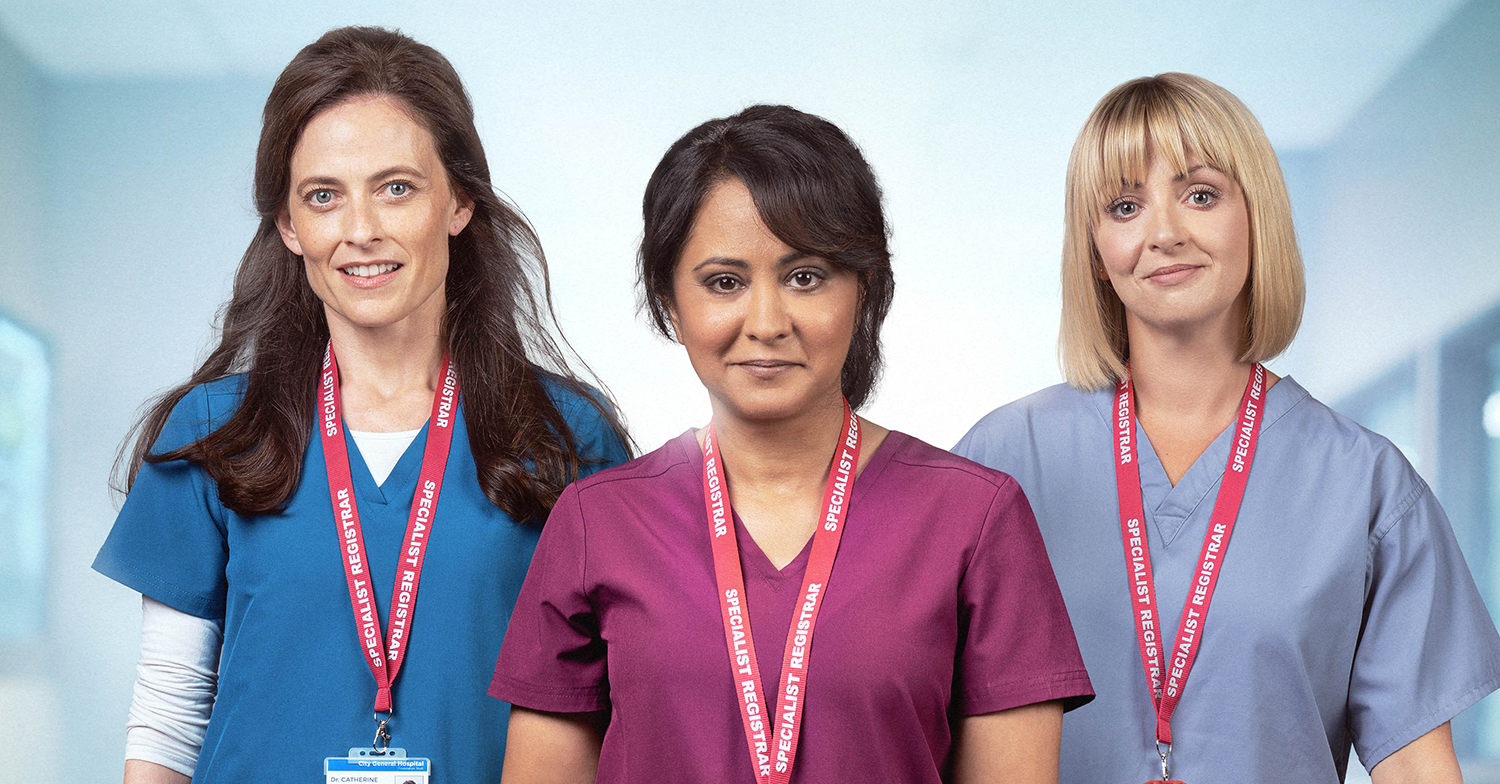 Three Maternal cast members in scrubs