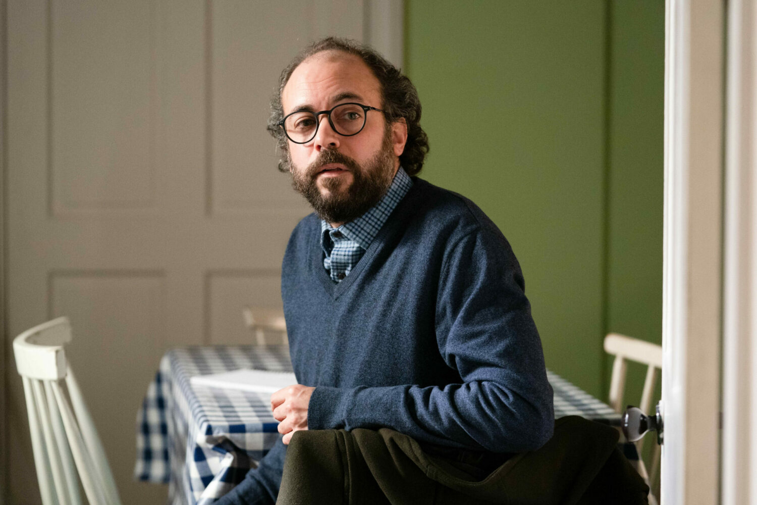 Reiss looks out of the kitchen longingly 