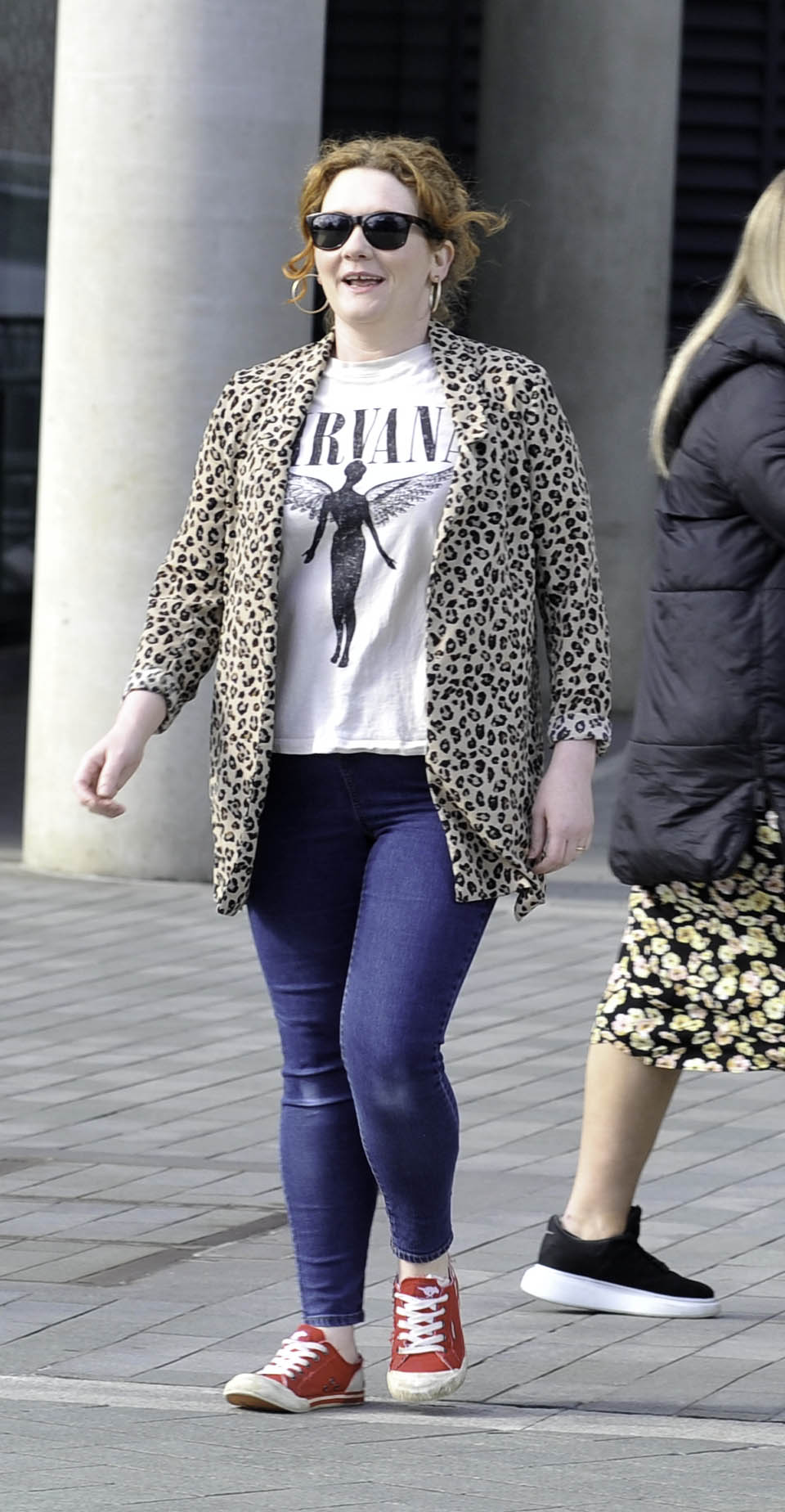 Jennie McAlpine in sunglasses in the street