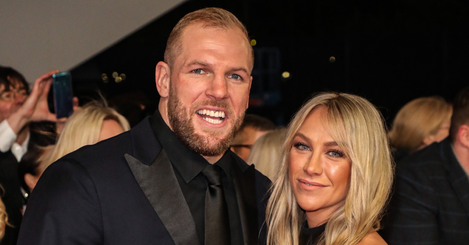 Chloe Madeley and James Haskell smile at event