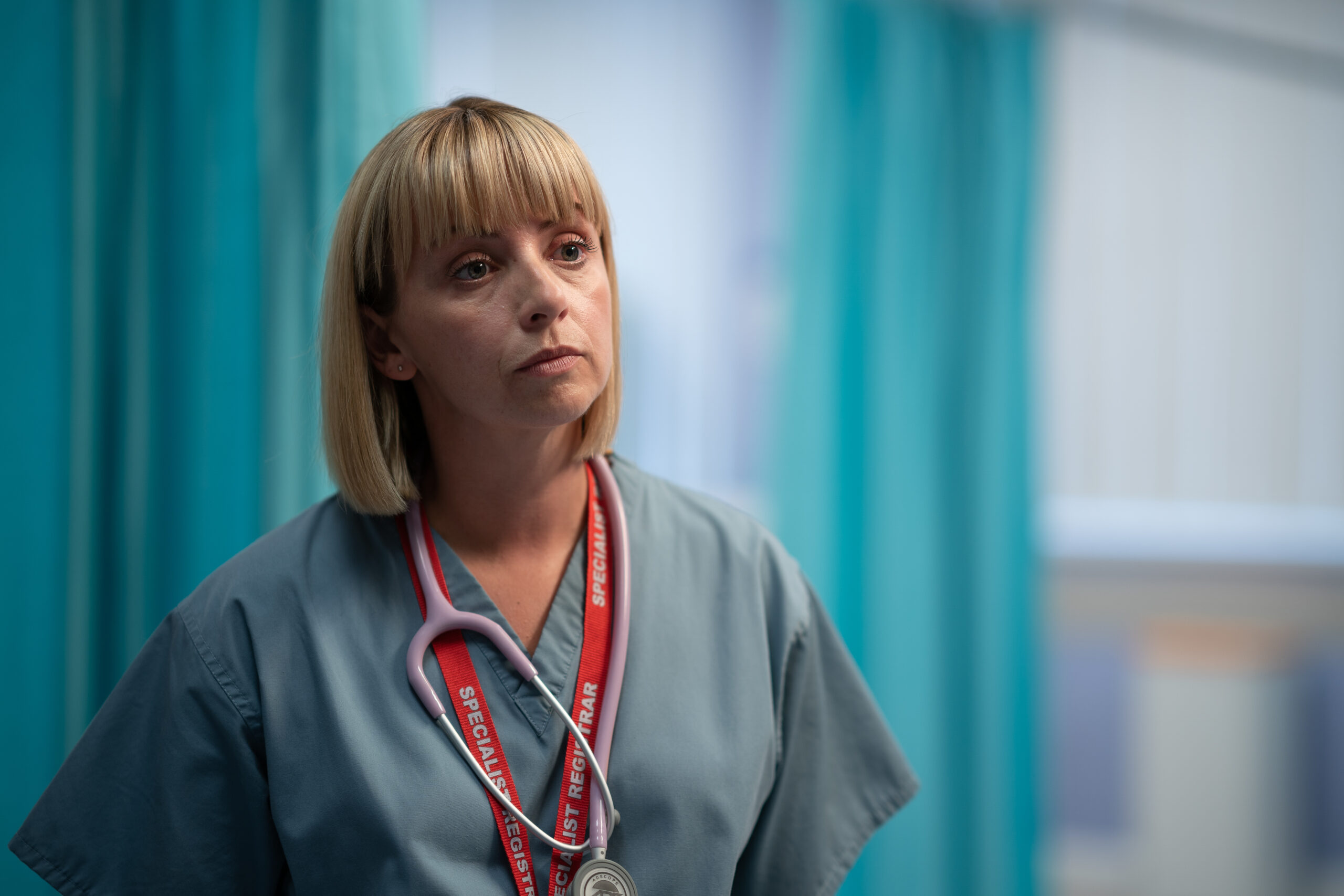 Helen frowns in a hospital room in Maternal