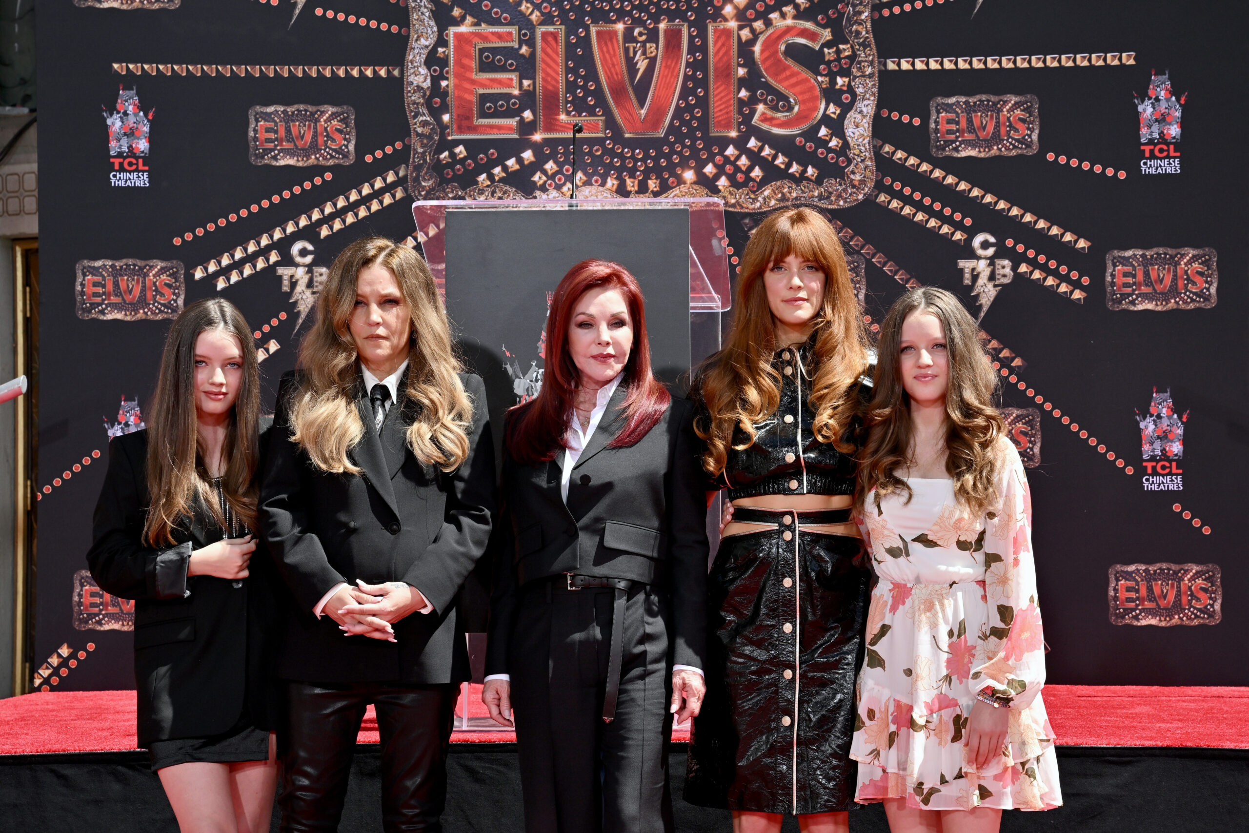 Lisa Marie and Priscilla Presley with their kids and grandkids