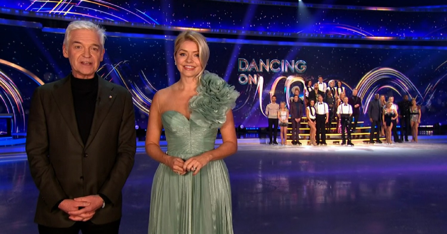 Phil and Holly standing in front of skaters on Dancing On Ice