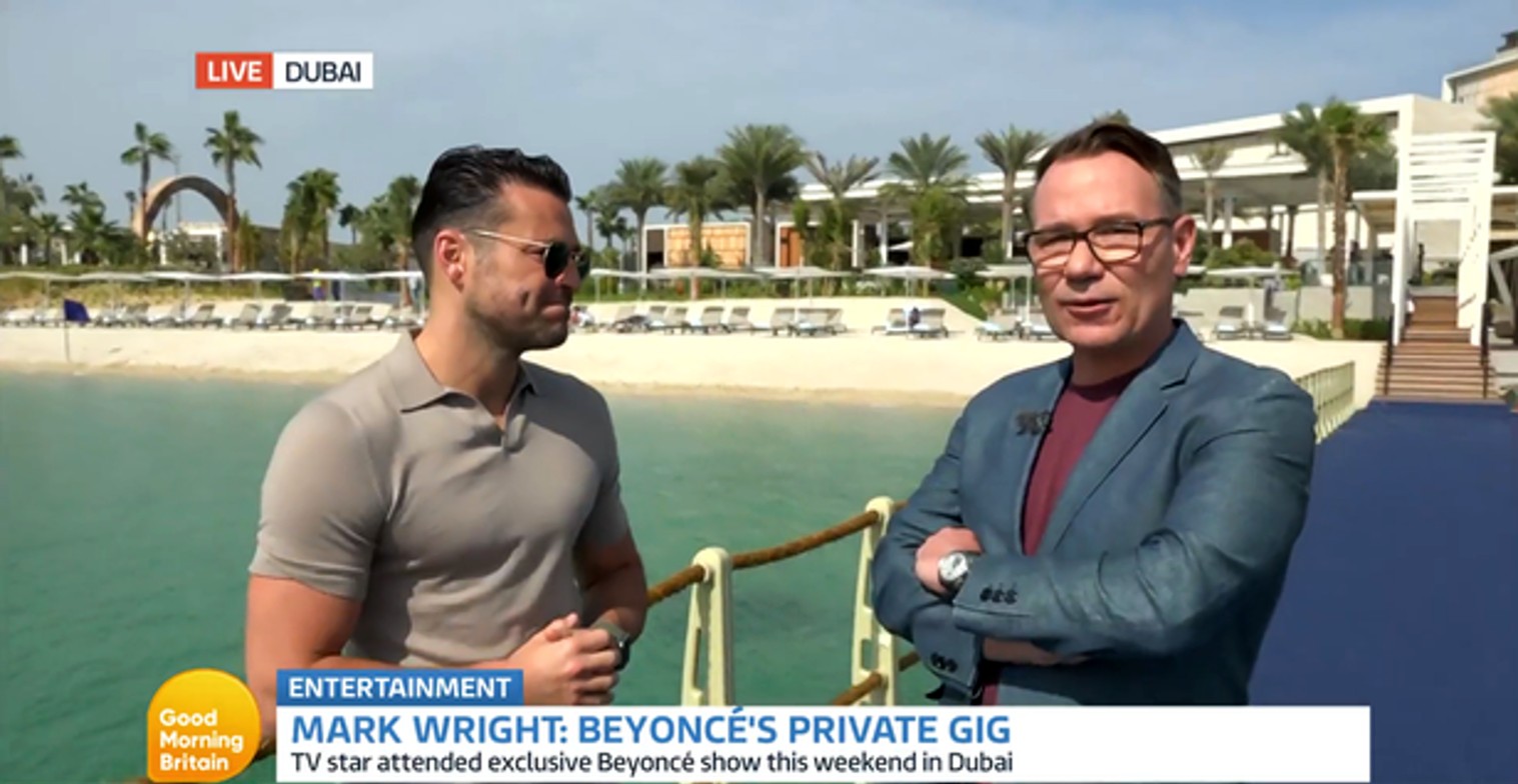 Richard Arnold and Mark Wright posing in Dubai on Good Morning Britain today