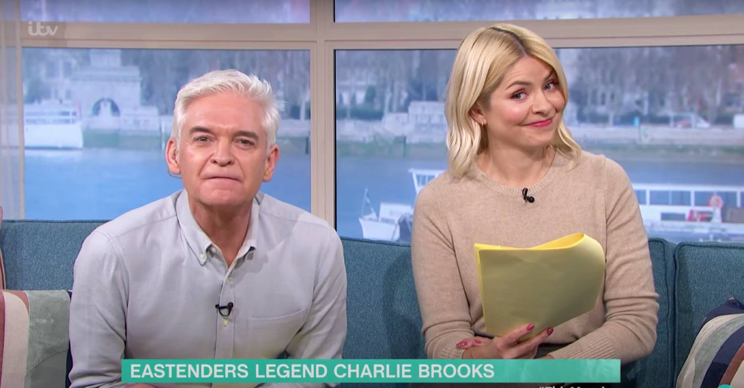 Phillip Schofield and Holly Willoughby smirk at the camera on This Morning today