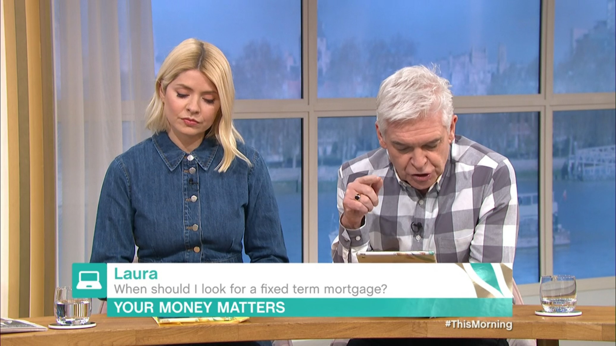 Phillip Schofield looks at his tablet on This Morning today