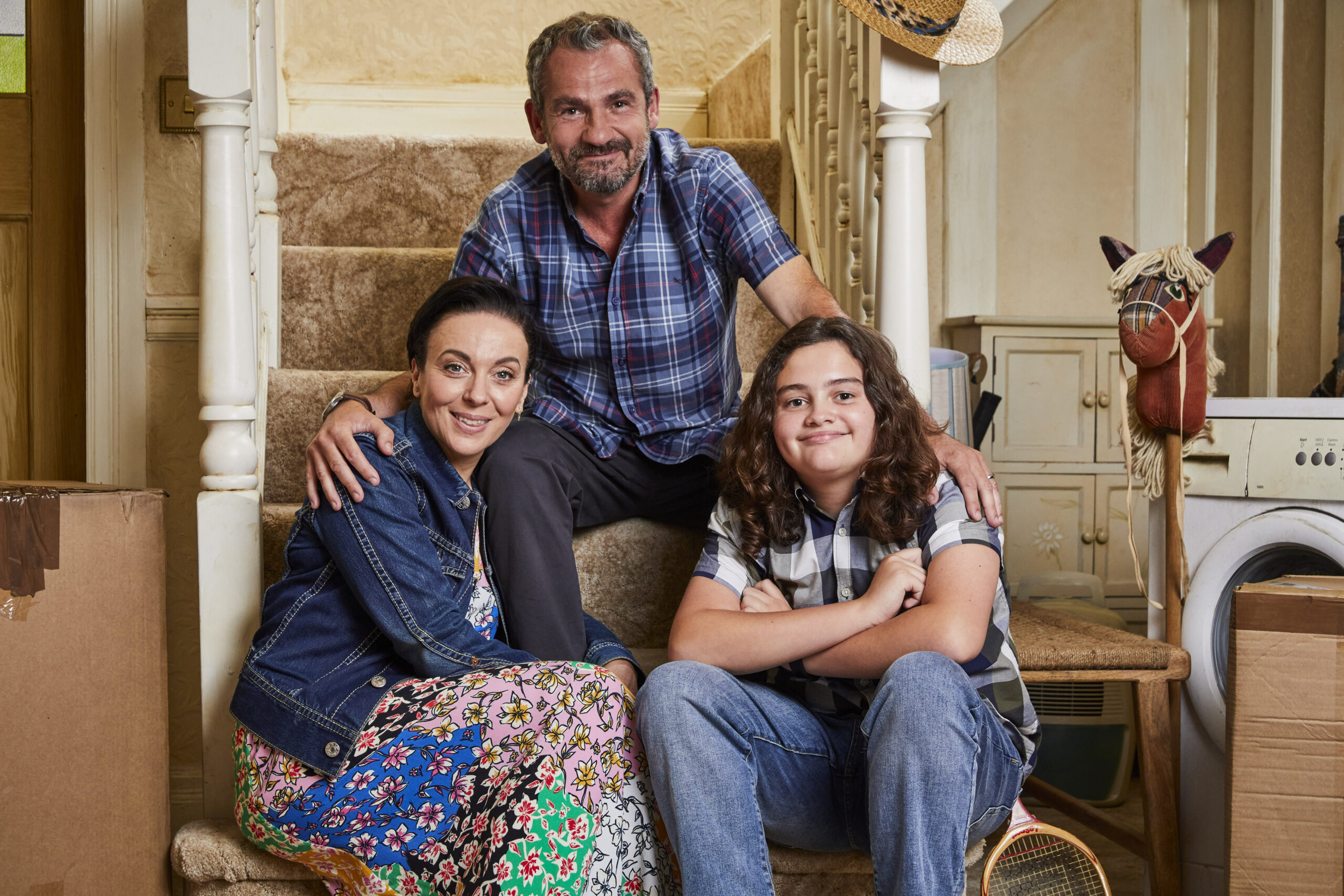 Nicole, Stuart and Connor pose together in The Family Pile