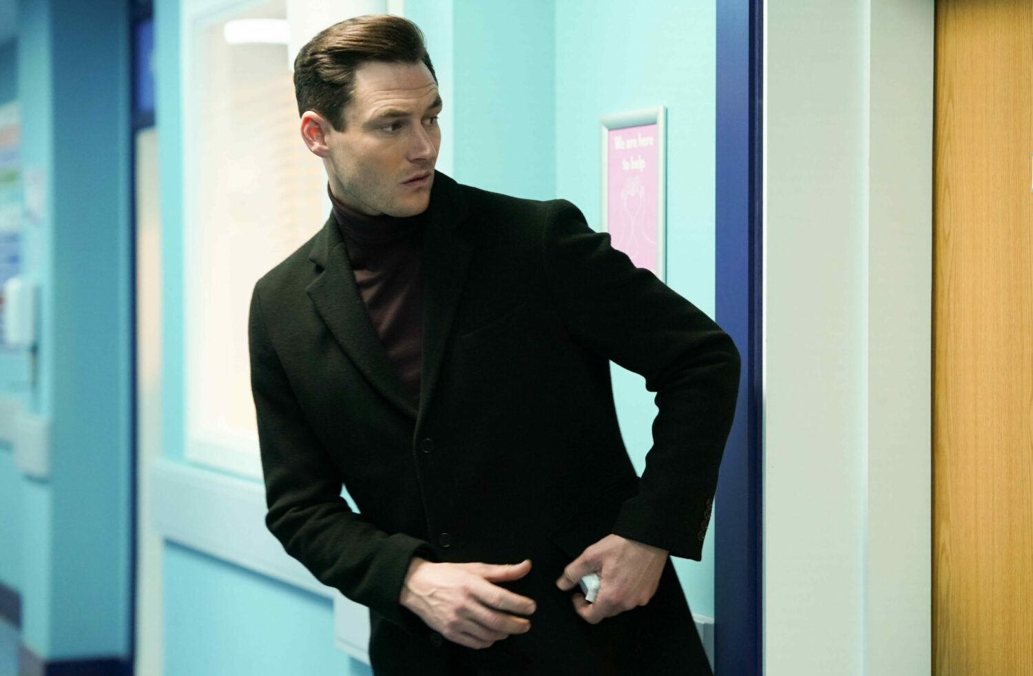 EastEnders: Zack shoves the pills in his pocket as he looks behind him