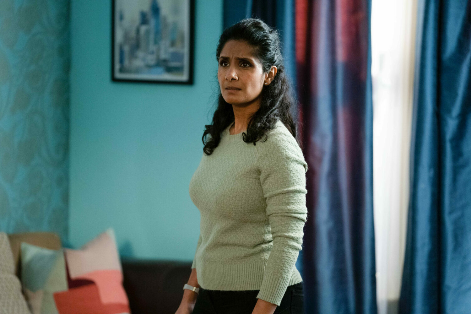 Worries Suki looks pleadingly at Nish in EastEnders