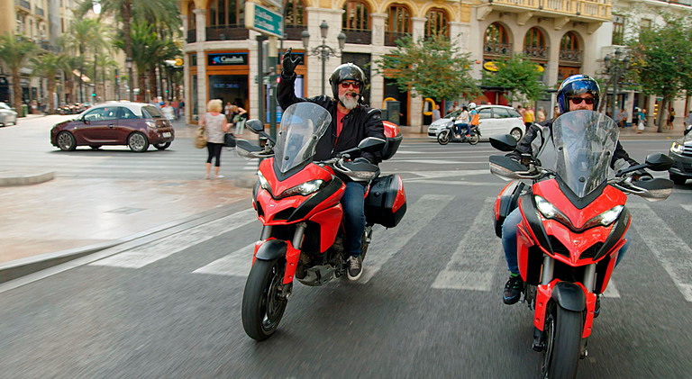 Dave Myers and Si King on motorbikes