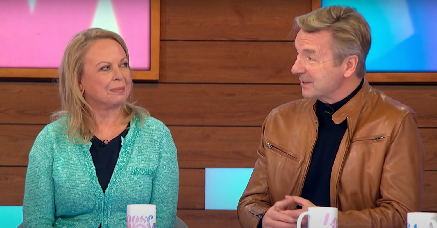Dancing On Ice 2023 stars Torvill and Dean looking and smiling at each other on Loose Women 