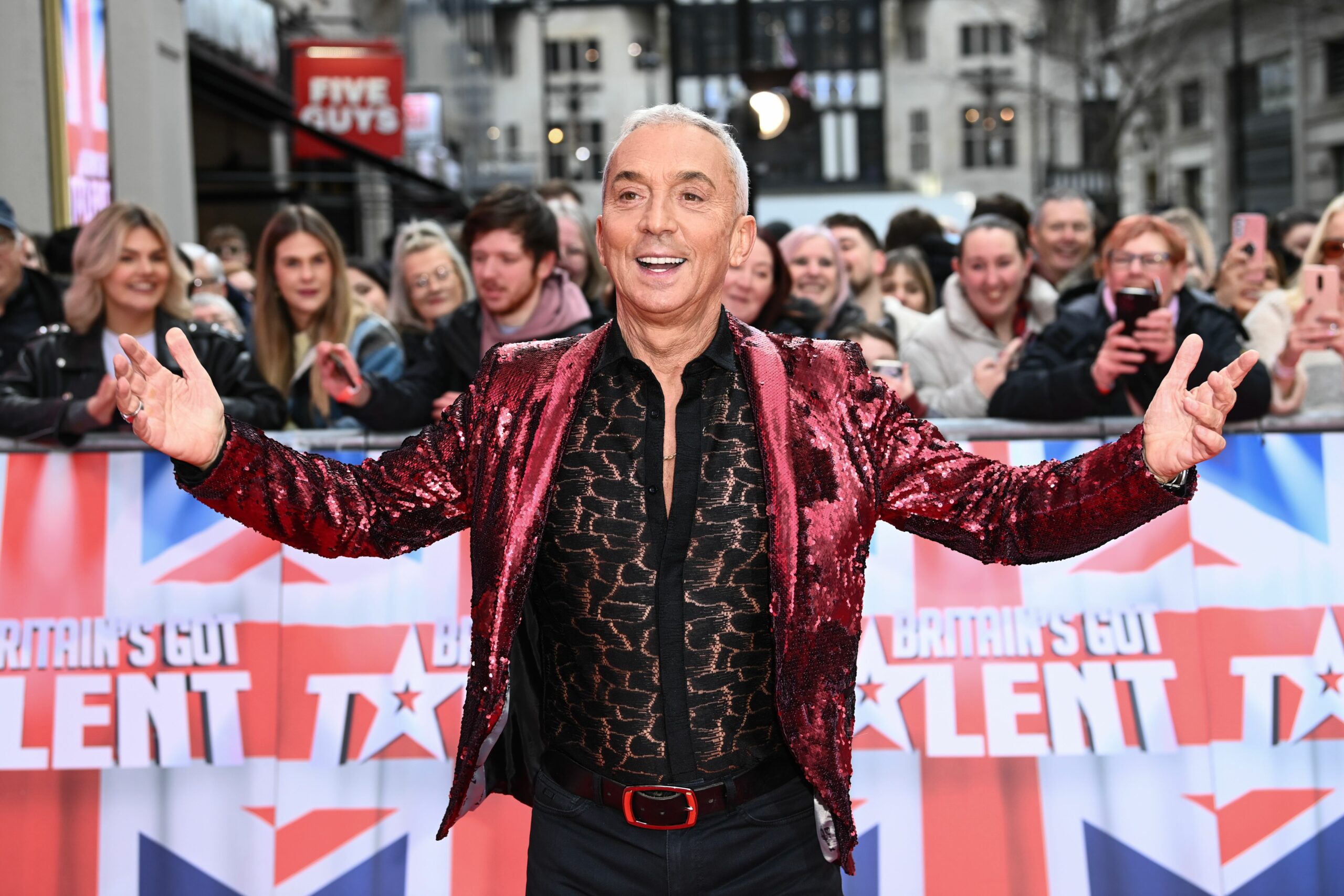 Bruno Tonioli throws his arms out wide as he greets the BGT crowd