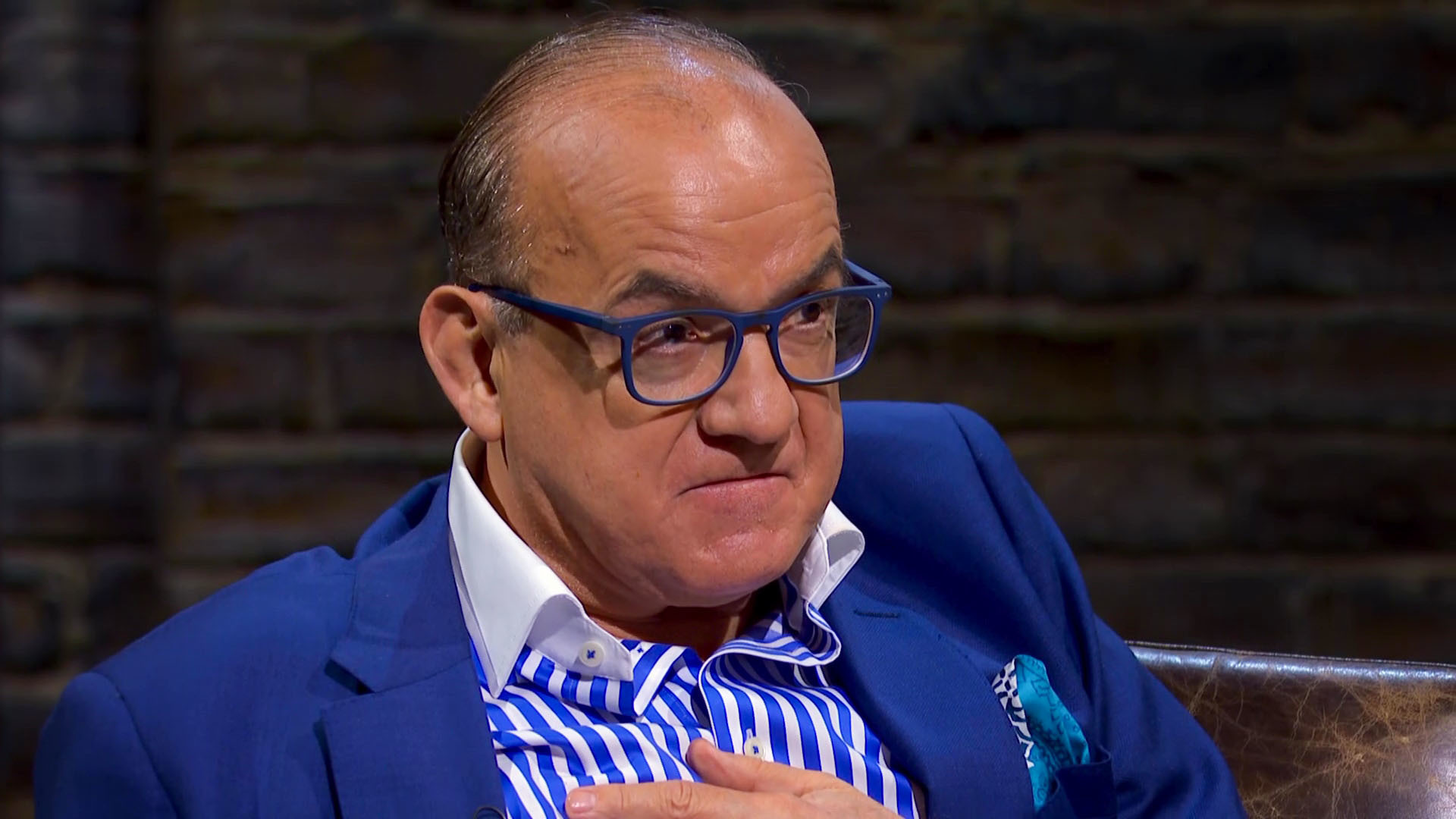 Dragons' Den fish skin handbags - Touker Suleyman in blue suit in Dragons' Den episode 5