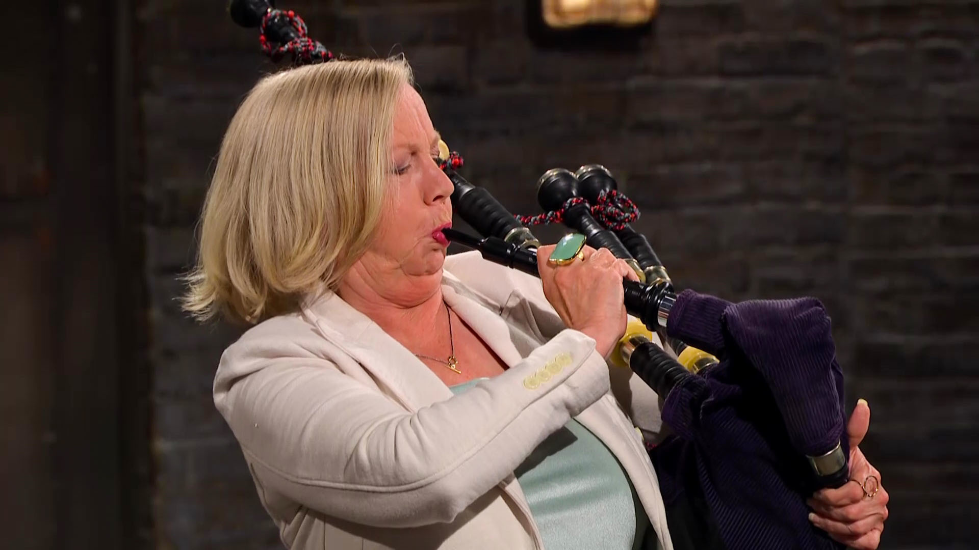 Dragons' Den fish skin handbags - Deborah Meaden blows on bagpipes in Dragons' Den