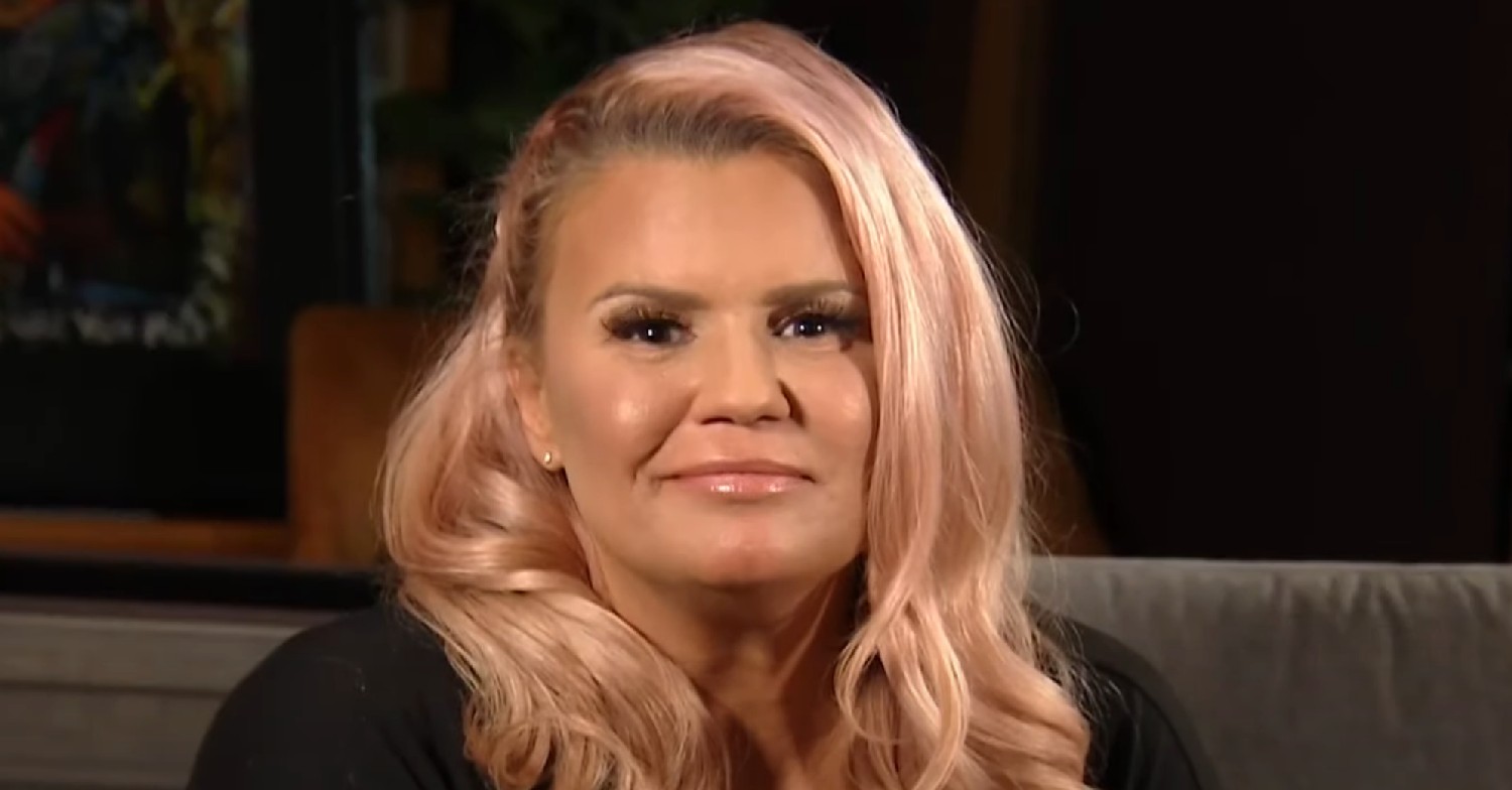 Kerry Katona smirking