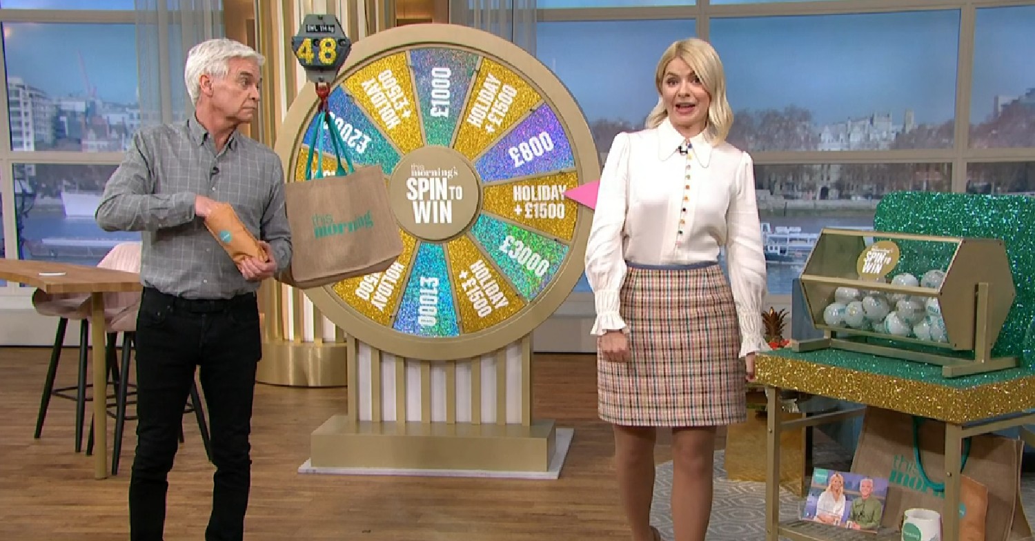 Phillip Schofield eating sweets next to Holly Willoughby on This Morning today