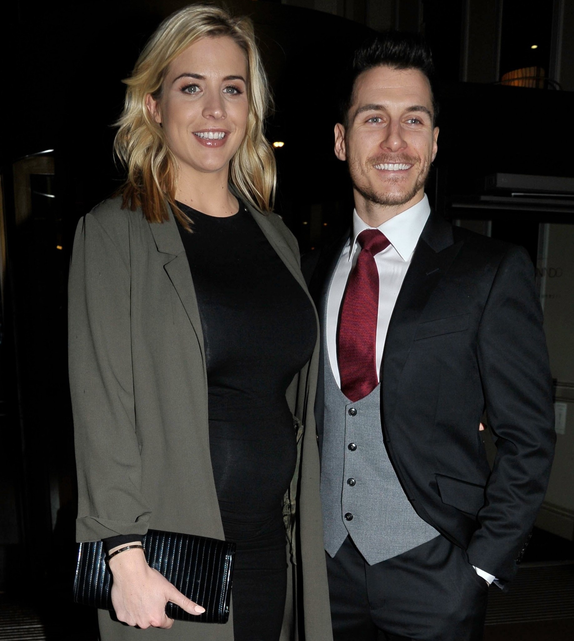 Gemma Atkinson smiling alongside Gorka Marquez at event