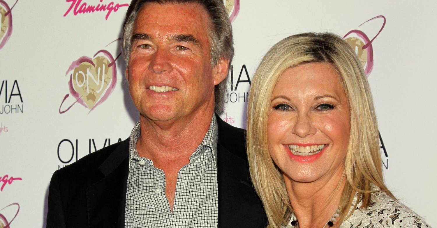 Olivia Newton-John and her husband John Easterling smile