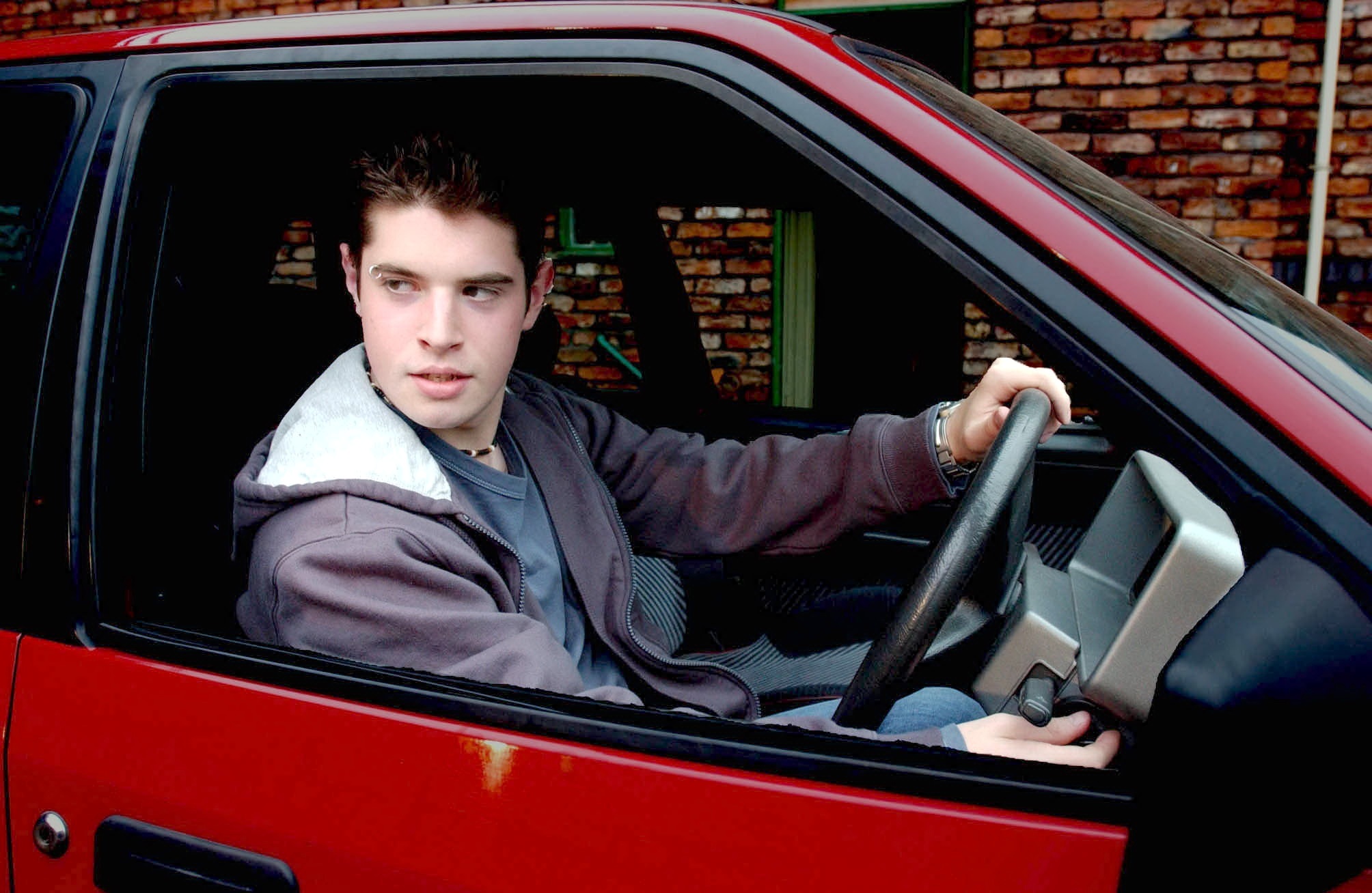 Aidan Critchley (Dean Ashton) goes for a joyride in Ken's car.