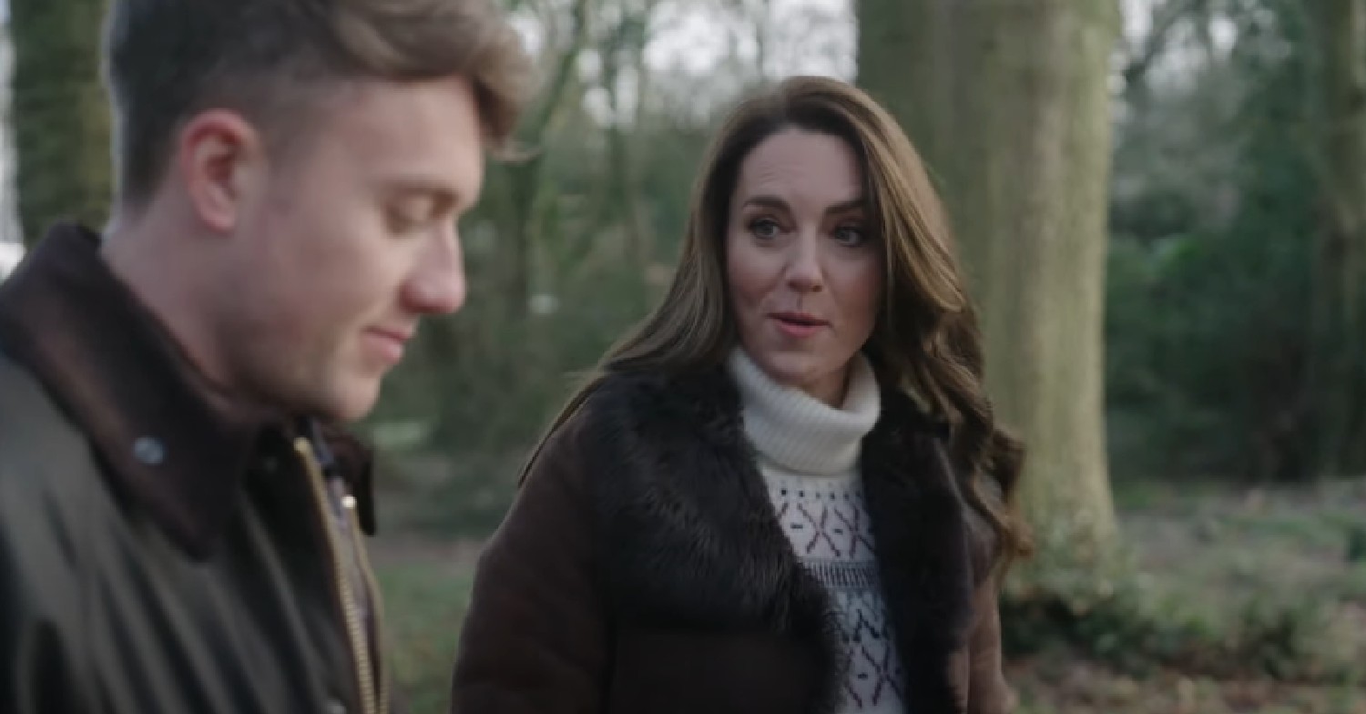 Princess of Wales looks at Roman Kemp as they walk outside