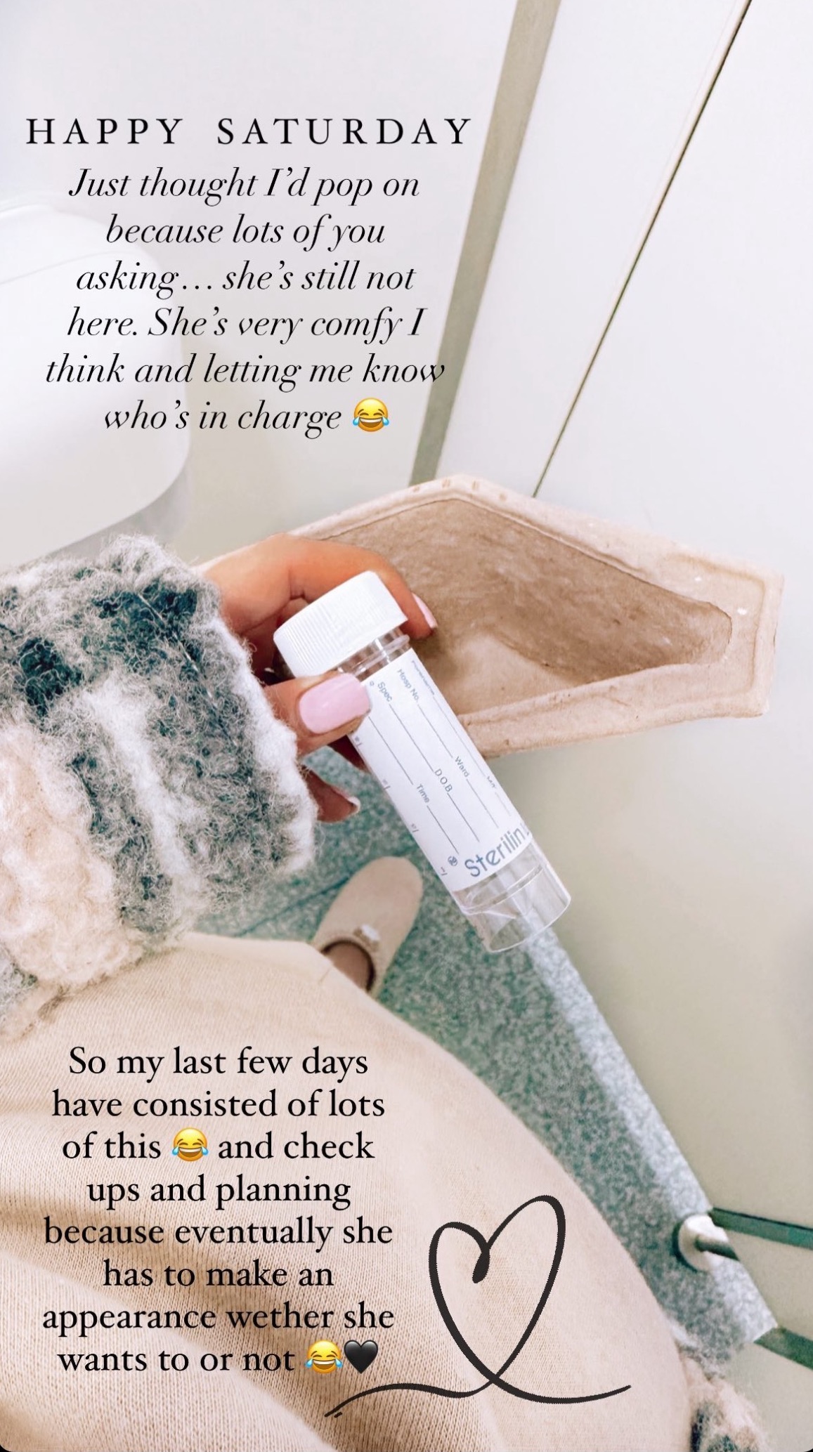 Stacey Solomon holding a urine sample pot