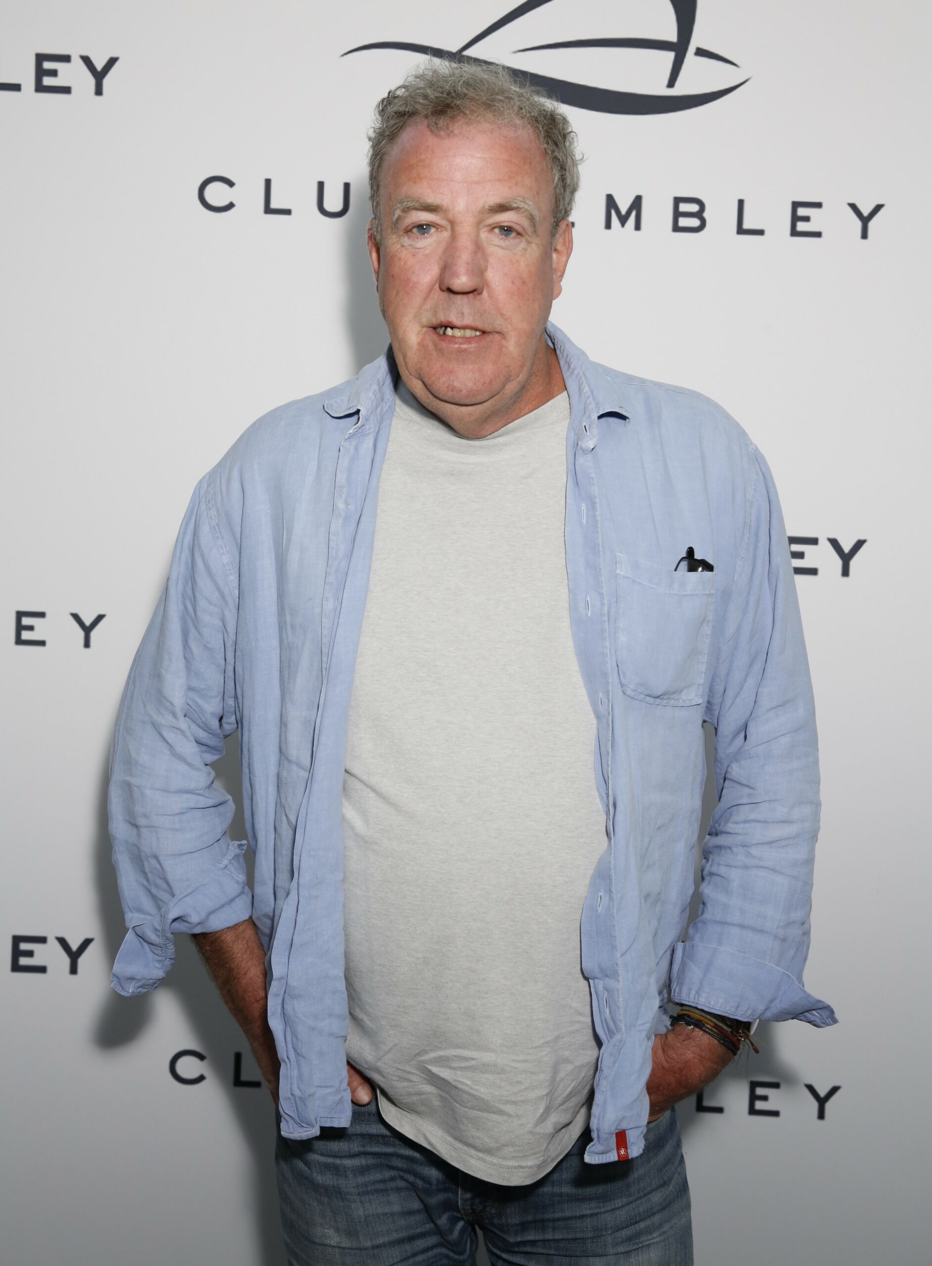 Jeremy Clarkson with his hands in his pockets at event