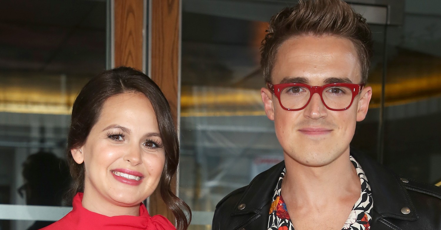 Giovanna and Tom Fletcher smiling at an event