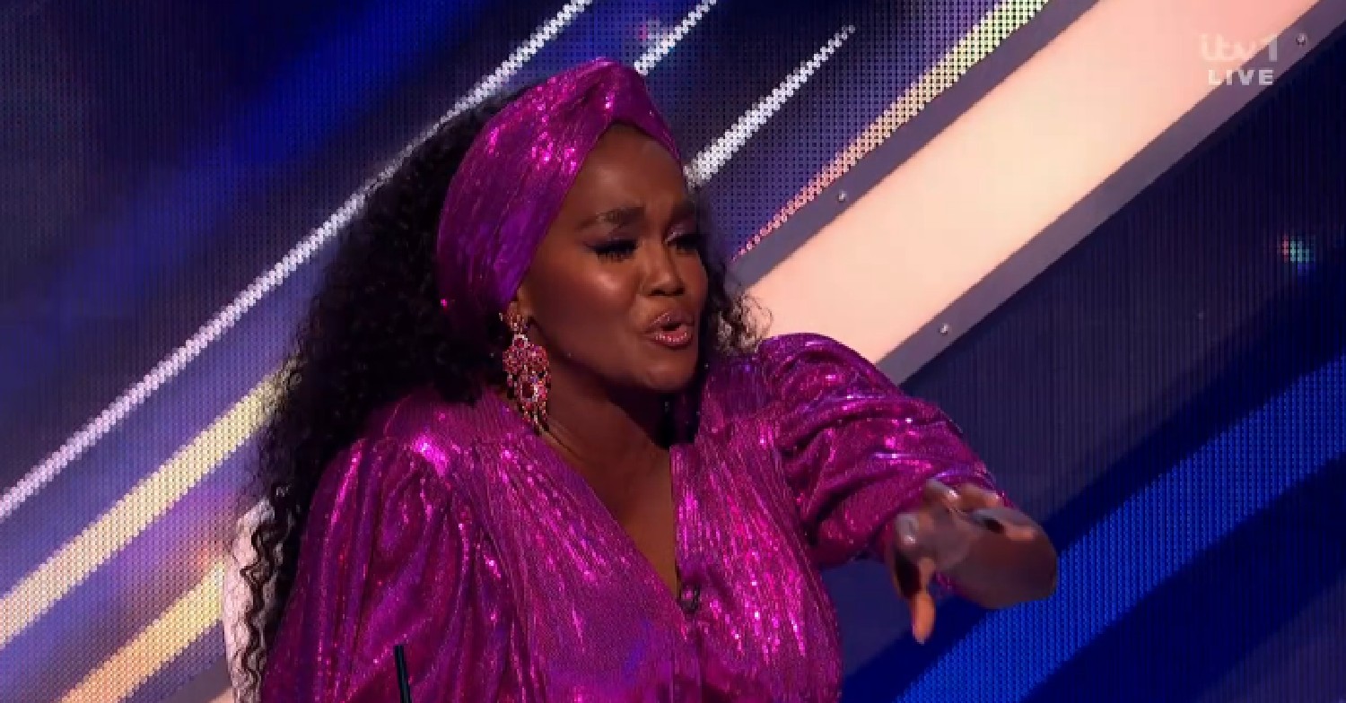 Oti Mabuse in purple outfit on Dancing On Ice tonight